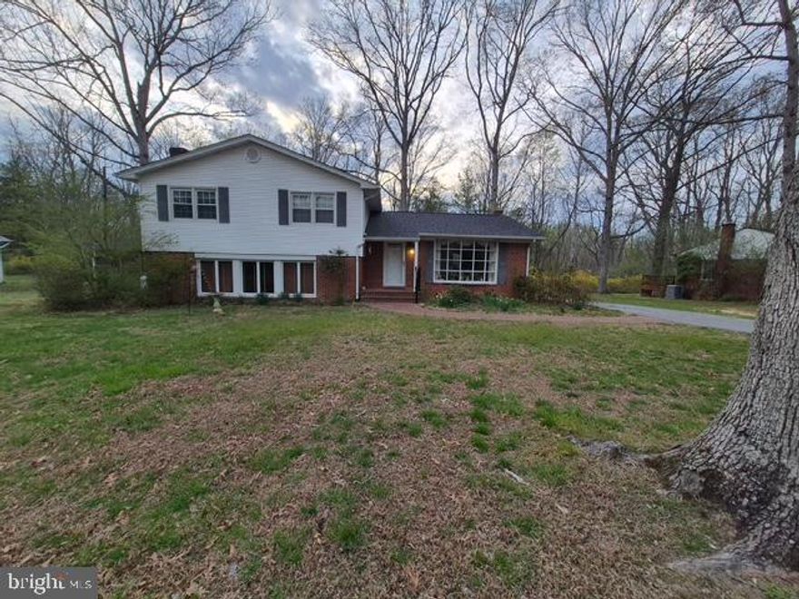 Welcome home to 22925 Maple Road! This well-maintained split-level in the heart of Town Creek! Offering 3 generously sized bedrooms and 2.5 baths, this home provides the perfect blend of comfort, space, and functionality. The primary bedroom features its own private half bath, adding convenience and privacy.

Beautiful hardwood floors run throughout the main living areas, creating a warm and inviting atmosphere. The lower level offers a versatile workshop space that could easily be converted into a fourth bedroom, home office, gym, or flex space to suit your needs. With a walk-out basement, you’ll enjoy easy access to the backyard, perfect for entertaining, relaxing, or outdoor activities.

Step outside to a screened-in porch, ideal for enjoying your morning coffee or unwinding in the evenings while overlooking the backyard. Major updates have already been taken care of, with a newer HVAC system and roof, giving peace of mind to the next owner.

This home is equipped with oil heat and a backup electric system for added efficiency and reliability. Conveniently located close to shopping, dining, schools, and local amenities, this property offers both comfort and convenience.

Don’t miss the opportunity to make this versatile and charming home your own!