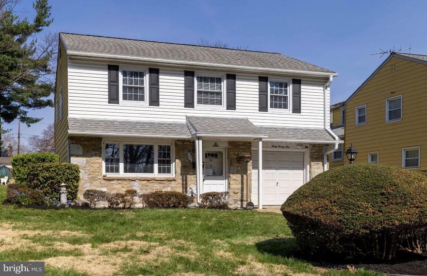 Welcome to this well-maintained single-family home in the highly desirable Winchester Park section of Philadelphia, perfectly situated with scenic park views. This bright and inviting home is filled with natural light and features a spacious living room that flows seamlessly into a formal dining room, ideal for both everyday living and entertaining.

The eat-in kitchen offers solid wood cabinetry, a gas range, built-in microwave, dishwasher, and garbage disposal, combining functionality with classic charm. The home includes three generously sized bedrooms and a well-kept three-piece hall bathroom with ceramic tile. The primary suite features its own private three-piece tiled bathroom with a stall shower.

The finished lower level provides additional living space with a comfortable recreation room highlighted by a gas fireplace, a fourth bedroom, and ample storage.

Additional features include central air conditioning, replacement windows throughout, and hardwood flooring where shown. Step outside to a rear patio and private yard with an in-ground pool—perfect for relaxing or entertaining during the warmer months.

Completing the home is a one car garage with an electric opener. A fantastic opportunity in a prime location, this home has been lovingly cared for and is ready for its next owner.