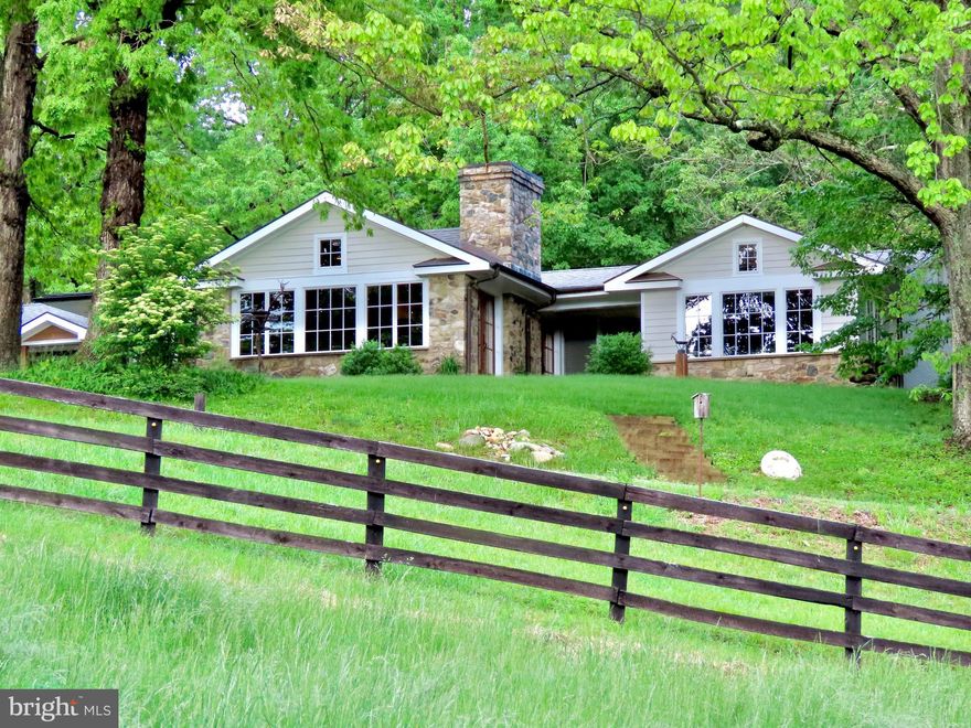 **Price Improvement!**Idyll Time Farm. Impeccably renovated rambler on 40+ acres in two tax parcels located just north of the Town of Leesburg and within close proximity to many wineries, breweries and venues while still maintaining privacy and rural character. The 4BR/2Bath Main residence boasts a gourmet kitchen with high end appliances, custom cabinetry with inset doors, and eco-friendly cork flooring. Architectural salvage fills the home from its doors, paneling, and interior trim--many features have been the result of custom repurposing of materials from old homes across the United States and Europe, making this home truly one-of-a-kind and not to be easily forgotten. The main level Master Bedroom is part of a new addition, along with a magnificent Family Room and Dining Room, all capitalizing on the pastoral and seasonal mountain views with walls of windows and french doors. The property also features an historic Log House, once featured in "This Old House" magazine. The Log House was painstakingly relocated from another part of the property to its current location in 2000, taken apart piece by piece and re-assembled making it an historic building that is built to the Codes of 2000. The Log House has been operating as a successful B&B for many years. The property also contains an 11 stall barn, with extra wide barn aisle, a large tack room with powder room and even a dog shower! There are approximately 15 fenced acres, tremendous ride out and a grass arena. Idyll Time Farm is an ideal venue location for either weddings, a winery or a brewery. Zoned AR1, no easements or deed covenants.