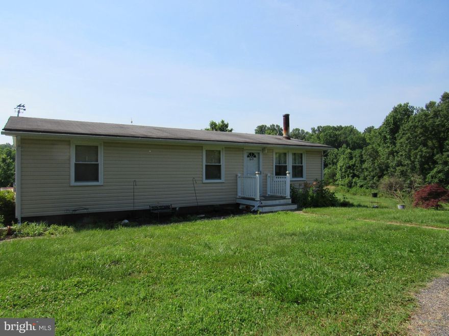 Cute older style modular with an addition on the back situated on approximately 6.03 acres.  Great location - convenient to all major roadways, shopping, employment centers, etc.  Own your "little piece of heaven" at a very affordable price.