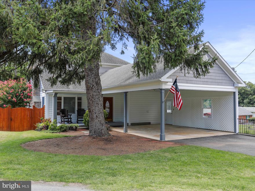 Back on the Market after the buyer could not get financing.  Welcome to this charming historic home nestled in the heart of Boonsboro, MD! This delightful 4-bedroom, 2.5-bathroom home, is ideally situated on a .2-acre lot. Step into a large living room featuring a cozy fireplace, perfect for gatherings, and enjoy the versatility of a formal dining room and an inviting family room. The galley kitchen is a chef's dream with its updated cabinets and modern appliances. Conveniently located on the main level, you'll find a bedroom that can also serve as an office, complemented by a half bath.
Upstairs, three spacious bedrooms and two updated full bathrooms await, with new carpeting adding a fresh touch. The full basement offers plentiful storage with both interior and exterior access. The backyard is an entertainer's paradise, featuring a cedar fence for privacy, a rear deck, a fire pit, and a charming outdoor shed surrounded by beautiful landscaping. With 2,160 square feet of living space and a two-car covered carport, this home blends historic appeal with contemporary comforts.