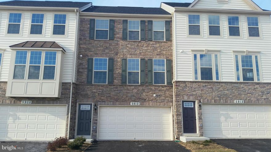 Largest model by Ryan Homes in the community Jefferson Place . 2 car garage with a BIG deck. Upgraded the 42" kitchen cabinets with gorgeous granite counters, hardwood stairs and hardwood floor in kitchen area. This spacious home features approximately 2,400.00 square feet. A open kitchen floor plan with center island is the perfect spot for entertaining family and friends. Upstairs, is the spacious owner suite with large walk-in closet and private bathroom which includes dual sinks, a shower and separate luxury tub. Walkout level basement with full bathroom and fireplace. Jefferson Place features innovative townhome living with the convenience of a planned Town Center, access to major commuter routes and breathtaking pastoral and mountain views. Amenities include an on-site community clubhouse with fitness center and outdoor swimming pool with a sand volleyball court, tennis court, basketball court, tot lot, dog park, walking trails and common area space. The community is convenient to downtown Frederick offerings quaint shops, restaurants and the famous Carroll Creek Walk and commuter routes like I-270 and I-70 and Route 15.