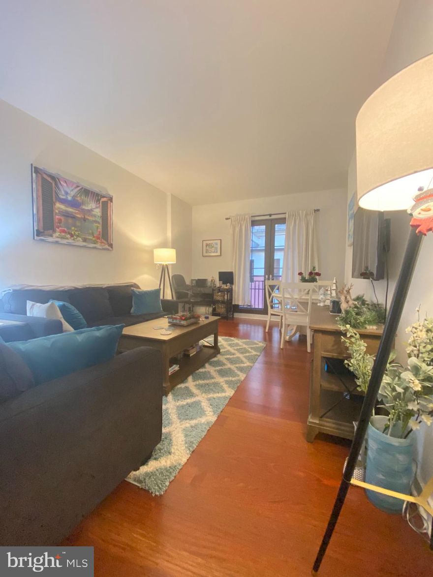 Generously sized one bedroom plus den/office with a Juliet balcony at Parc Rittenhouse on Rittenhouse Square! Enter the home through a large foyer that leads into the living/dining room. The home features Brazilian cherry hardwood floors throughout and a separate kitchen showcasing contemporary cabinetry that has brushed stainless steel bar pulls, granite countertops, stainless steel GE appliances and a LG washer/dryer. The full hall bathroom is appointed in marble with a contemporary vanity with marble countertop and a shower/tub. Residents of Parc Rittenhouse enjoy world class amenities and services including a 24 hour doorman; an amenities suite that includes a brand new state-of-the-art fitness center and resident lounge with pantry; media room; outdoor rooftop pool club with a large pool deck, full size pool, kids pool and hot tub; garage parking below the building for an additional fee; and two amazing restaurants on the ground floor, Stephen Starr’s Parc and Via Locusta.