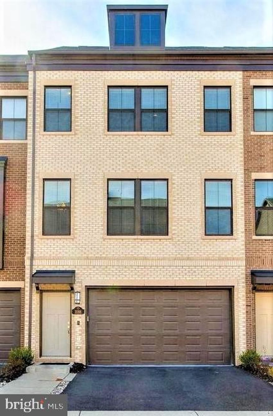 2019 Built Gorgeous Townhouse, 4 Bedrooms, 3 full, 2 half baths, 2 car garage  with  Main Level Deck & Rooftop Terrace in Sought after Discovery Square. Townhouse on Premium Lot backing to Parkland & only select ones in Discovery Square with Front Loading Garage  &  Backyard. Townhouse is East facing with Natural sunlight all thru the day. Immaculately maintained townhome that has upgraded kitchen, baths, appliances and wine bar! Contemporary and Open Floorplan with Hardwoods on Main Level Living space including Great Room, Dining room, and Upgraded Gourmet Kitchen with Stainless Appliances, Large Island, Huge Walk in Pantry, Backsplash, Wine Bar, and Beautifully maintained Granite! 10 Ft Ceilings on Each level! Composite deck off kitchen perfect for grilling and relaxing to watch the sunsets over the park space! Upper Level 1 has the Primary Bedroom with walk in closet, private ensuite bath with dual sinks, spacious Walk in Closet. Two other large bedrooms with additional full bath and laundry closet on bedroom level. The Top Most Level has Rooftop Terrace plus Loft/Media Room/Rec Room/ Office, has additional Half bath! The lower level Basement has a 4th Bedroom with ensuite Full Bath. The Basement has Walk out to the Open Rear Yard. has a walkout to rear door in additional to full 4th legal bedroom with ensuite full bath. Townhome backs to Sully Highlands Park with baseball fields, soccer fields, playgrounds and new Rec Center with pool! Close to Metro, Restaurants, Shopping, Grocery, Gas Stations. Connect easy to Sully Road, Dulles Toll Road, Fairfax County Pkwy, Dulles Airport. Long & Foster Realtors Online Rental application only to apply. Vacant , Available immediate to rent.