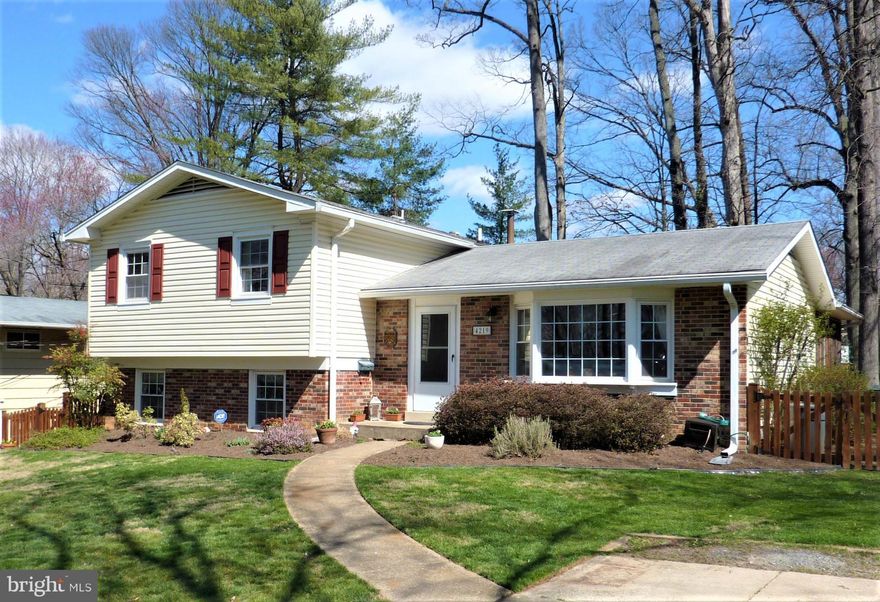 This wonderful home in an amazing location won't last long!  Gorgeous split level that has been updated throughout, and well maintained, has it all: hardwoods on main & bedroom levels, granite counter tops, beautiful kitchen back splash, brand new SS appliances, screened porch, deck, wood burning fireplace, jetted soaking tub & more.  There is a large fenced back yard, and a spacious storage shed.