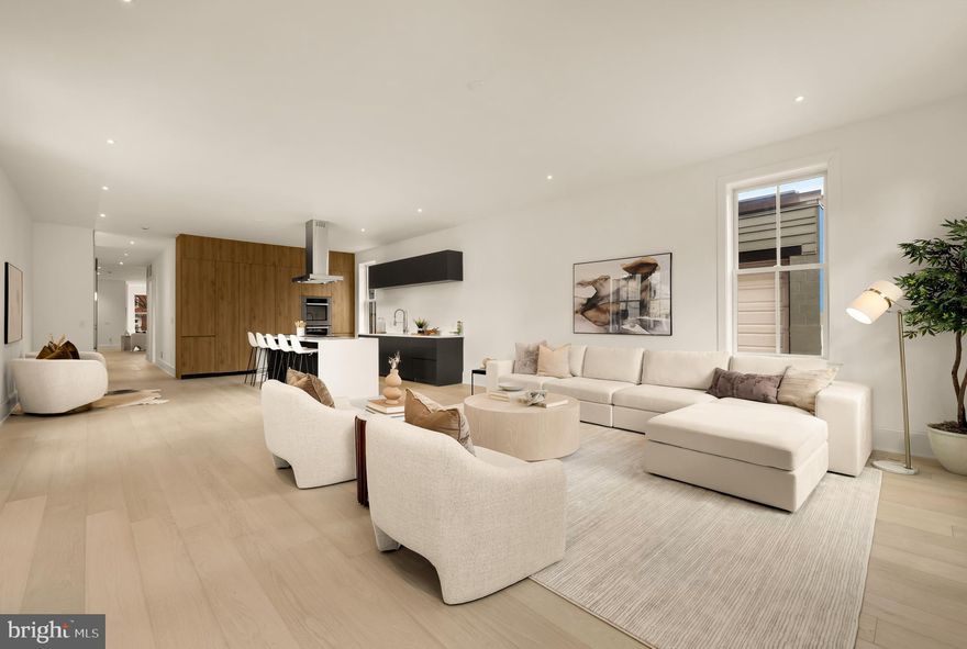 Welcome to 329 8th Street NE, a state-of-the-art 5 bedroom, 4.5 bath, mixed-use commercial MU-4 zoning custom compound ideally positioned in a premier Capitol Hill setting, just steps from SCOTUS and the U.S. Capitol. With highly coveted residential and commercial zoning, this rare offering is perfectly suited for a prestigious Hill headquarters, diplomatic residence, or an exceptional modern home in the center of Washington’s political and cultural life. Semi-detached and bathed in natural light from three exposures, this fully reimagined residence offers approximately 5,000 square feet of thoughtfully designed living and working space, enhanced by two-car off-street parking. Every detail has been crafted  sophistication in mind, from wide-plank white oak flooring, to Porcelanosa tile, and bespoke finishes.

At the heart of the home is a show stopping chef’s kitchen, equally at ease hosting intimate dinners or large-scale entertaining. Premium appliances and a separate catering kitchen bring both beauty and functionality together in one central gathering space. The expansive lower level provides a large-format retreat, complete with a theater room, gym, and a private guest suite with its own entrance. The upper level is anchored by a luxurious primary suite, featuring a spa-inspired bath and energy-efficient systems throughout. Additional bedroom suites and versatile living spaces provide endless options for personal comfort or professional use.

Whether hosting distinguished guests, leading operations from a refined Hill headquarters, or embracing elevated everyday living, 329 8th Street NE is a rare Capitol Hill masterpiece, an extraordinary opportunity in one of Washington’s most iconic neighborhoods.