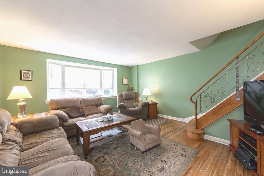 Welcome to this spacious Rhawnhurst twin home. Colorful and mature trees provide ample privacy for your front patio, summer BBQs. This home also provides 2 car parking (garage + driveway), wood floors throughout and central air! Enter through one of 2 side doors at the main level or through the lower level back door or through the garage. At the main living level you have a tiled entryway with a hall closet, a large open room for living/entertaining with a bay window, a separate dining room plus kitchen where 2 can collaborate on meal prep. The kitchen has all the appliances you want and need: gas stove, French-door refrigerator with ice & water dispensers, microwave and dishwasher. The hall bath with stylish, retro wall paper & tile is on the way down to the lower level for recreation, laundry and parking. Or do as the current owner has done: set up your own home gym in the garage! Upstairs you will find 3 spacious bedrooms with ample closets, a hall bathroom plus linen and cedar closets, and an ensuite master bathroom. Sellers upgraded the windows, electric, and steel door between the garage and house plus installed a new heater in 3/2020. Minutes from Acme, Rite Aid, Food Wine & Spirits, and the Rhawnhurst Recreation Center. Short 10 minute drive to I95 and to the Trenton Rail Line at the Holmesburg SEPTA Station. Even closer to all the shopping and dining you’ll want or need on Roosevelt Boulevard! Seller has found suitable housing so no need for a leaseback- you get to move in right after Settlement!