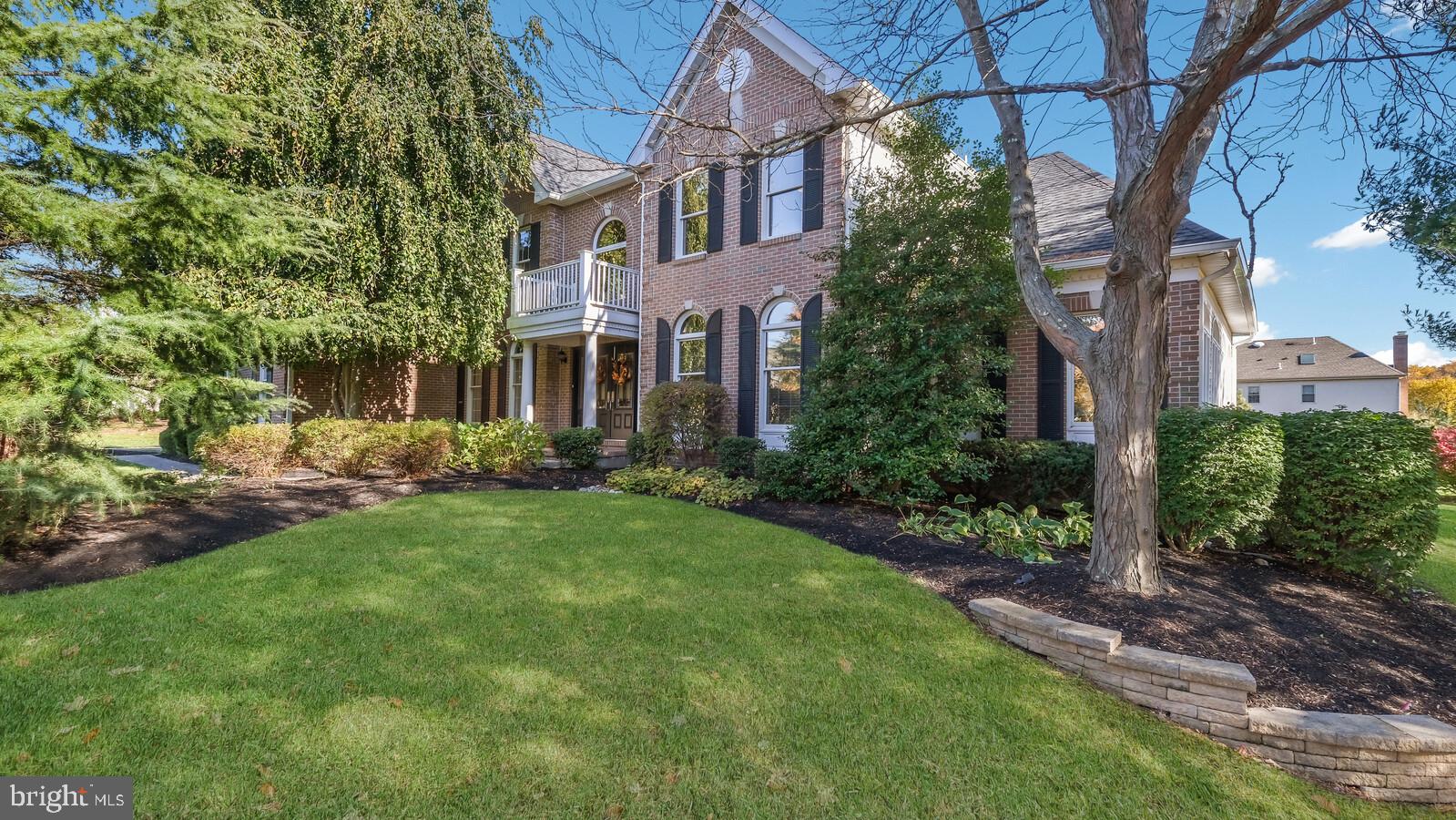 When an agent says, I would buy this house, you know its exceptional! Located at the end of a beautiful tree lined street in Yardley Estates, this home will dazzle you! The owners have fully updated each and every room in this house with exquisite taste. You will immediately see this as you enter the two story foyer. To the right is a formal living room with double glass doors showcasing the large bright sun room with two walls of built-in custom cabinets, tray ceilings and window seat. Warm and cozy, who wouldn't enjoy watching the changing of the seasons through the abundance of windows! The formal dining room is to the left of the entry with a generous powder room in the hall. The kitchen has been updated with an abundance of custom cabinetry topped with quarts counters. All SS appliances are Wolf & Sub-zero brand. The island is topped with leathered granite and Wolf stovetop cooking. The eat in kitchen with skylight opens into the living area with a wood buring fireplace. All hardwood flooring has been updated over the years. Main floor mud room / laundry area is off the kitchen with three floor to ceiling custom built in cabinets. Perfectly located connecting the 3 car garage.
Upstairs you will find an amazing master suite with a large sitting area and huge walk in closet. A beautiful frosted glass pocket door reveals a gorgeous en suite bathroom with an enormous shower and soaking tub.
Down the hall the second bedroom also has its own beautifully updated full bath as well as two more ample sized bedrooms with a jack & jill bath.
The full basement is fully finished and shows as an apartment! A teenagers or in-laws dream! There are several rooms, one of which can serve as a 5th bedroom with its own full bath. The largest room or rec area has a built in granite table suitable for high top chairs . The basement is set up for entertaining. Whether its football parties, holiday gatherings or children's play area there is plenty of space to please everyone! There is also a large separate storage room as well. Utilities are conveniently tucked away in rooms with doors with easy access. There is a bonus room behind frosted glass doors for the wine enthusiast to house their wine collection. Bilco doors lead to back yard.
Surrounded by mature trees and bushes, the back yard features a travertine patio with stone kitchenette area and built-in BBQ which is hooked up to gas. Conveniently located with quick access to NY, NJ and Philadelphia, award winning Pennsbury school system and plenty of entertainment and dinning. This home will truly impress! If ever there was a dream home, this is it!