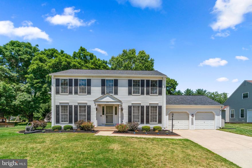 Exuding storybook charm and curb appeal, this charming Colonial-style home presents 3 levels with over 2,600 finished square feet, 4 bedrooms, 3 full baths, 1 half bath, and a 2-car garage. The beautiful white exterior is complemented by stately black shutters, manicured landscaping, and a portico entry inviting you inside the residence. Filled with natural light, the main level features hardwood floors, elegant mouldings and trim, a chic neutral color palette, formal living and dining rooms, a powder room, and a family room with recessed lighting, a door leading to the deck, featuring a large outdoor grill. Overlooking the family room is the well-designed kitchen adorned with sleek granite counters, white cabinetry, stainless steel appliances, coordinating backsplash, wonderful natural light, recessed lighting, and an island with a breakfast bar table feature. The spacious owner’s suite includes an array of windows, a dressing area with a built-in vanity, and a private bath with a dual sink vanity. The lower level is highlighted by a rec room, a game room, a bonus room, and a full bath. The entirety of the home is wired with CAT6 Ethernet. Additionally, the home has two smart/wifi garage door openers, and dual EV (240V) charging outlets, convenient for electric cars. This property boasts a gorgeous lot with trees and greenery in a cul-de-sac setting. The wonderful outdoor living spaces include a low-maintenance deck, a patio with a grill, and a large open backyard. Enjoy this desired Howard County location convenient to shopping, dining, parks, schools, commuter routes, Old Ellicott City, Columbia, and more.  WELCOME HOME!