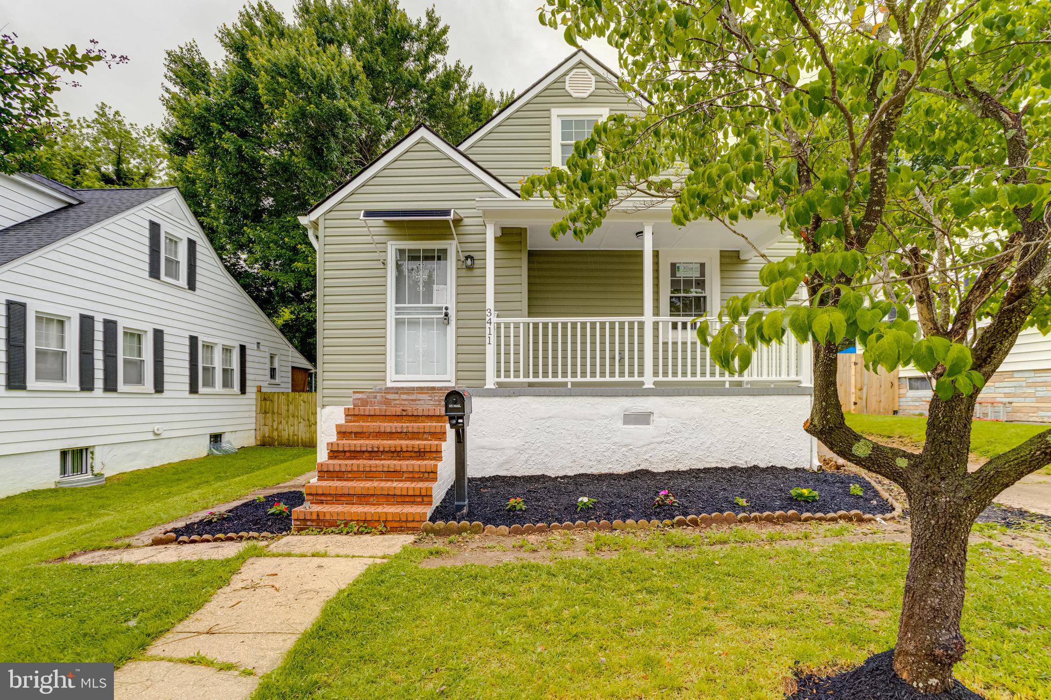 BACK ON MARKET, BUYER'S FINANCING FELL THOUGH! Fully updated Craftsman on quiet street close to everything ! Over 2,000 finished sq ft of living space with 5 bedrooms and 3 full baths now available! You'll love the open floor plan on the first floor featuring a main level BR and FB, hardwoods throughout leading to a chef's kitchen with countertop seating and GE SS appliances that flow right into a new rear deck with fenced in flat back yard! Ascend to the upper level and be greeted by soaring ceilings in your spacious primary BR and full bath! The fully finished basement includes two additional sleeping areas and a third full bath with a rough-in for a future wet bar/kitchenette along with cabinets ready to go! A new roof, new electrical & plumbing plus a new roof along with 4 car driveway parking makes this home a must see!