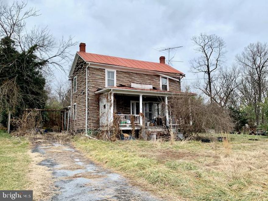 Living in the heart of Charming Boyce, Virginia.  Colonial situated on approximately a .38 acre lot on water/sewer.  Looking for a structure to renovate, this 2 story home is calling for attention and care.  Original woodwork and hardware throughout. Large kitchen space, living room and up to 3 bedrooms on this large in town lot off the high traffic roads.  This property is convenient to major commuter routes, including Rt. 7/Harry Byrd Highway, and is approximately 75 minutes from the DC metropolitan areas.