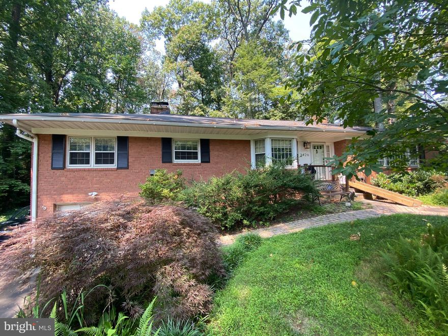 Beautiful rambler - in sought after and idyllic Lake Barcroft community. 4 bedrooms, gorgeous kitchen with tin ceiling, corner fireplace, custom built Silestone island, large eat-in space, stainless steel appliances, plenty of storage space; double oven, brick accent wall. Updated baths, wood floors, gorgeous large custom built mantel in LR, screened in porch, large rec room has another fireplace, plenty of space for exercise, crafts, etc. Lovely lushly fenced in yard with mature shrubbery. Delightful plantings and abundant hardscaping. Two level deck. Garage and additional 1/2 garage in back of house. Lake Barcroft is the best kept secret around - private lake inside the Beltway with 5 sandy beaches, kayaking, swimming, ice skating, fishing and loads of community activities.