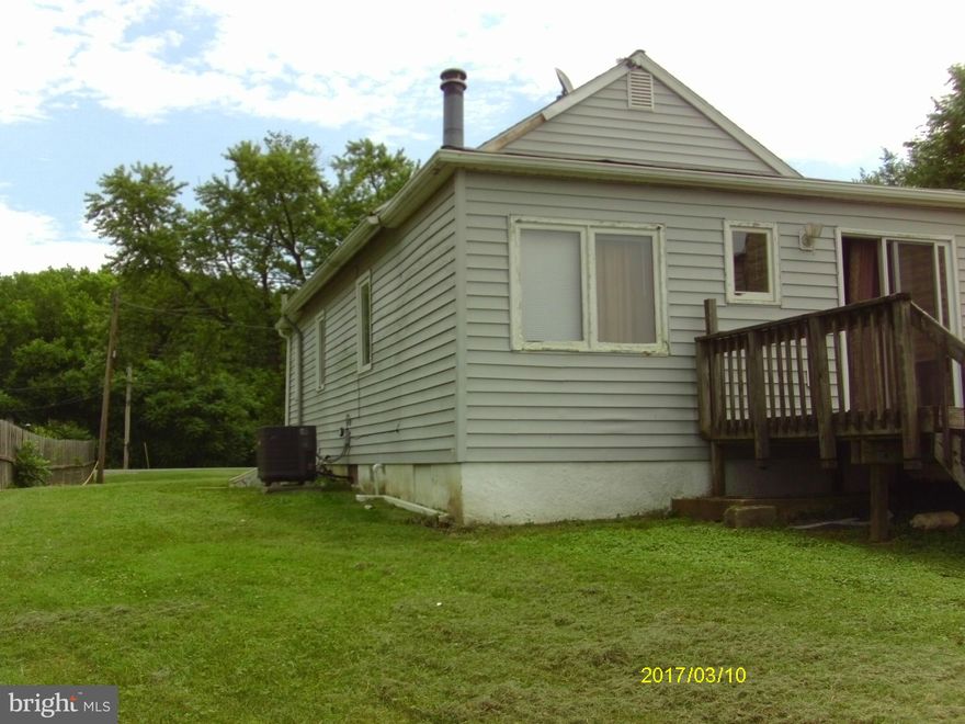 The property includes two homes:  1150 is a two bedroom, living room, kitchen dining area, wood stove and full bath, and laundry with washer and dryer, handicapped ramp to back door.  Laundry has a stacked washer and dryer.   Lower level is unfinished.   1152: has one bedroom, one bath, living room, wood stove, eat in kitchen, and a den in the front of house.  Lower level is unfinished.  Must call  listing agent to make appts.