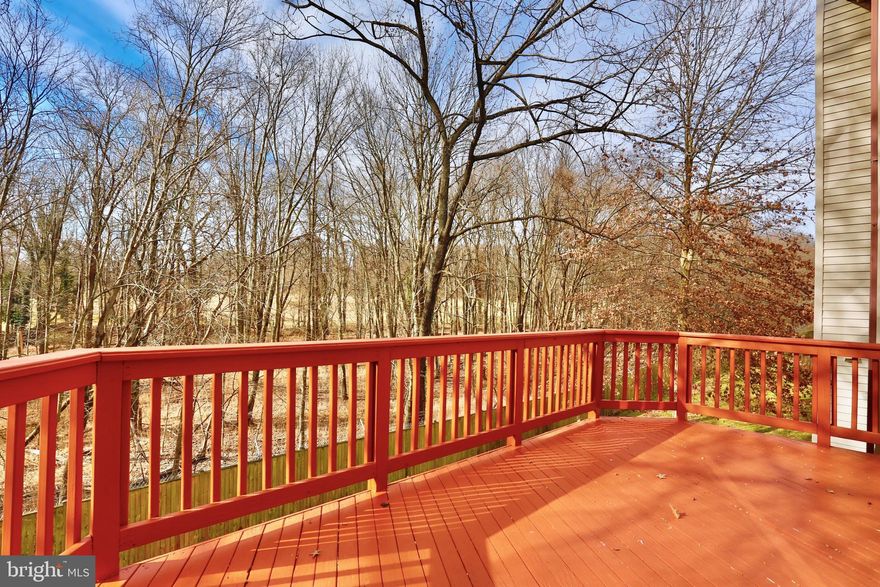 An absolutely gorgeous, impeccable, light-filled home in the sought-after Woodmont Overlook community, Enjoy views of the Woodmont Country Club from the eat -in kitchen and upstairs main bedroom. Second and third upper level bedrooms have vaulted ceilings. Renovated from top to bottom; baths, kitchen, roof, floors, doors, everything!. Deck renovated in 2022. Stylish table-space kitchen totally renovated in 2023. . Freshly painted. Hardwood on main and upper levels installed a year ago. This small exclusive community is a close walk from all the best of Rockville Pike, Congressional Plaza, Pike & Rose, Downtown Rockville, and a short distance to Twin Brook Metro. Huge retail project and Wegman's reported to open in 2025. Convenient one car garage and parking pad. Nothing but fabulous.