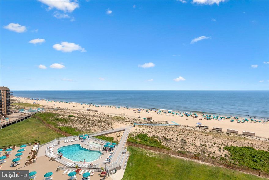 Wake up to endless Atlantic views in this pristine and truly unique 3-bedroom, 2-bath corner condominium in the highly sought-after Edgewater House of Sea Colony East. One of the most coveted locations along the coastline, this oceanfront retreat offers panoramic sunrise AND sunset views from an expansive wraparound balcony—a rare and breathtaking feature. Spanning over 1,500 square feet of sun-filled living space, the home showcases tasteful upgrades throughout and has been freshly painted for a crisp, move-in-ready feel. A fresh neutral palette, coastal décor, and diagonal ceramic tile flooring flow seamlessly through the main living areas, kitchen, and oceanfront guest room. The remodeled kitchen features elegant Brookhaven Sandalwood cabinetry, built-in storage, neutral Corian countertops, new backsplash, under-cabinet lighting, updated hardware, and a Bosch dishwasher—perfect for entertaining or relaxed beach living. Additional upgrades include crown molding, upgraded interior doors and hardware, smooth ceilings (no popcorn), and a full-size laundry room with washer and dryer. The oversized primary suite is a private sanctuary with newly installed carpet, its own west-facing balcony, and an updated en-suite bath featuring a new glass shower door and upgraded hardware. An oceanfront guest bedroom/den with balcony access shares an upgraded Jack-and-Jill bathroom with a third bunk room; the second guest bedroom also features new carpeting, comfortably accommodating up to eight guests. Designed with convenience in mind, this condo offers exceptional storage, including three locked owners’ closets. Meticulously maintained and offered fully furnished and turnkey, it is ideal for immediate enjoyment or as a high-performing rental investment with potential seasonal income exceeding $80,000. Step outside and immerse yourself in Sea Colony’s premier oceanfront lifestyle—a half-mile of private, lifeguarded beach, scenic promenades, five heated outdoor pools, indoor and outdoor lap pools, a 17,000-square-foot fitness center, and the USTA Award-Winning Tennis Center with indoor championship courts.