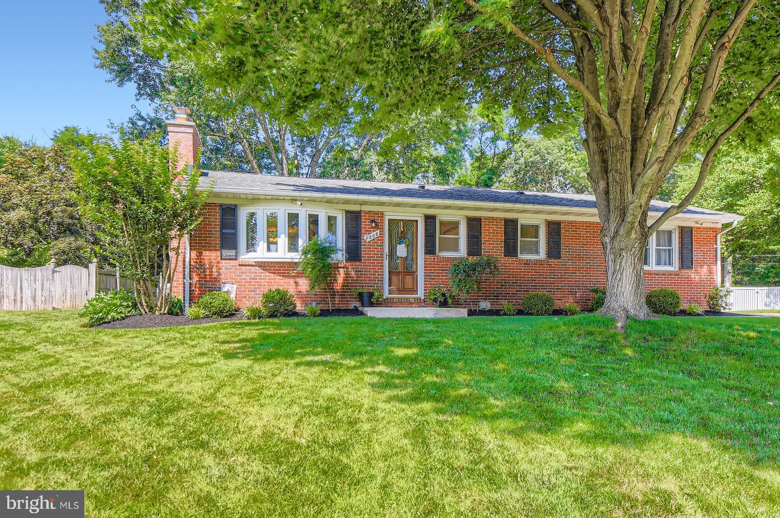 Beautiful, fully customized rancher in Bynum Ridge with a 2+ car detached garage backing to woods!! This 4 bed, 3 full bath home greets you with refinished wood floors and a high efficiency wood stove in the living room. The kitchen was remodeled in 2023 with a SS farmhouse sink, SS appliances complete with gas cooktop, 42" cabinets that provide abundant storage and the in-ceiling speakers make even doing the dishes fun. The master en suite and hall bath both have dual radiant heating. The fully waterproofed downstairs really sets this home apart from the rest. Mini splits HVAC units keep everything comfortable. And the custom wet bar with Amish made cabinets, concrete countertops and 3 tap kegerator for entertaining. It's also wired for surround sound so you won't miss anything while shooting pool. The 4th bedroom in the basement has an egress window in case of emergency. Whole house coax, ethernet and HDMI make connecting devices a breeze. And the buried service lines keep the backyard safe and looking great for entertaining. This home also boasts a 50 amp generator hookup with natural gas connections for when the storms are too much. Take ownership before the school year and have the piece of mind that this exceptionally well cared for home will take care of you and your family.