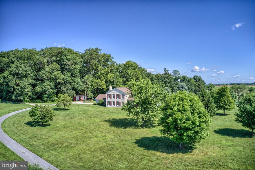 1ST TIME OFFERED FOR SALE*UNIQUE PROPERTY HAS 2 HOMES, 2 WELLS & 2  SEPTICS W/A SHARED DRIVEWAY*AS YOU FACE THE PROPERTY TO THE RIGHT IS 2200 BLACKS SCHOOLHOUSE (APPROX 3300 SQ FT)* THIS HOME HAS A TREMENDOUSE AMOUNT OF SQ FTG & IS PERFECT FOR AN IN LAW QUARTERS ON THE 1ST FLR W/A GENEROUS SIZED BEDROOM, FULL BATH, LAUNDRY & FAMILY ROOM*  THERE ARE 4 ADDITIONAL BEDROOMS ON THE 2ND FLOOR INCLUDING THE OWNERS SUITE WHICH HAS A WALK-WAY TO A HUGE UNFINISHED ATTIC AREA*MOSTLY ANDERSEN WINDOWS* THE ROOF WAS REPLACED IN 2020 & 3  OF 4 WINDOWS  WERE REPLACED IN ATTIC AREA*DET GARAGE OR POLE BUILDING W/CONCRETE FLOOR*THE 2ND HOME IS A COLONIAL W/3 BEDROOMS & OPEN FLOOR PLAN (APPROX 2200 SQ FT)*THE 1ST FLR HAS AN OPEN KITCHEN W/FAMILY Y ROOM, LIVING & DINING ROOMS & LAUNDRY* THE UNFINISHED BASEMENT INCLUDES THE WOODSTOVE*THE PROPERTY IS ZONED AG & AG TAX IS DUE AT TIME OF TRANSFER PAID BY BUYER IF ITS REMOVED FROM AG*PER CARROLL COUNTY THIS PROPERTY HAS LOT YIELD POTENTIAL OF 2 VACANT LOTS PLUS ONE OF THE HOMES W/LAND & THEN THE REMAINDER*THE FARMER HAS FARMED THE LAND & RESERVES THE FRUITS OF HIS LABOR FOR THIS HARVEST SEASON*THIS IS AN "ESTATE" SALE & THE PROPERTY IS BEING SOLD "AS IS"