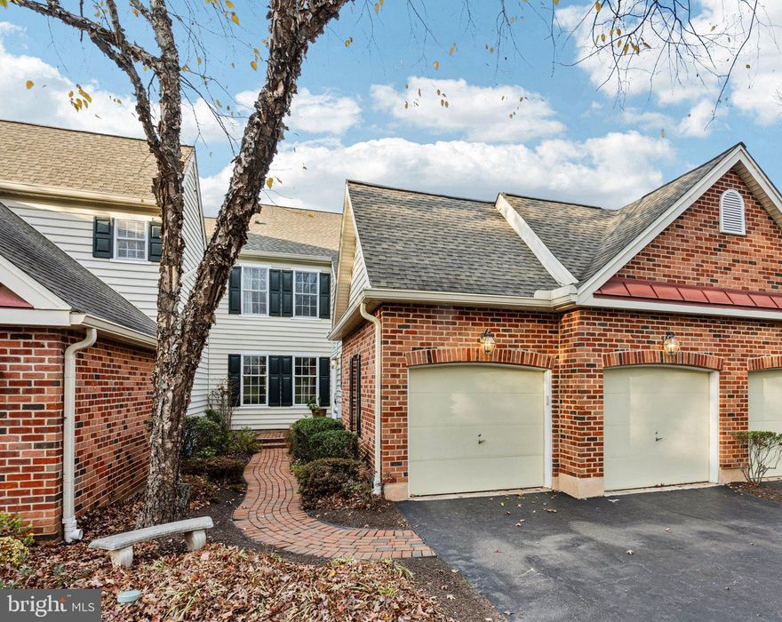 Nestled on a quiet cul-de-sac in the Fernleigh Community in Phoenixville, you will find 9 Fenwyck Circle. This stunning, well maintained 4 bedroom, 3.5 bath Carriage House exudes charm and style and offers a spacious open floor plan perfect for today’s busy lifestyle. Take note of the oversized 2-car garage at the front of the home and the lovely brick sidewalk which leads to the front door. As you enter the home you are immediately greeted by the natural light flowing into the 2-story foyer which also accents the beautiful hardwood flooring throughout the main level. Just off the foyer to the right you will see a formal dining area perfect for large gatherings, and to the left is a spacious entertaining area which could flex to meet your living needs. Continuing to the Great Room you are welcomed by a fabulous kitchen with custom tile backsplash, walk-in pantry, pendant lighting, recessed lighting, stainless steel appliances, sleek white cabinetry as well as a center island breakfast bar and a casual dining area with large windows which welcome the natural landscape inside. The kitchen opens to the family room complete with a cozy fireplace framed by 2 sets of patio doors which lead out to a large private deck.. A half bath and entrance to the 2-car garage completes the main level. The upper level offers a spacious Primary Bedroom with tray ceiling and ensuite bathroom with soaking tub and 2 spacious walk-in closets, plus 2 additional bedrooms and a full bathroom in the hall. A huge bonus is the designated 4th bedroom with ensuite bathroom on the lower-level plus a separate living area which could be perfect for use as a guest suite, multi-generational living, or more! A storage and utility area complete the lower-level. This home offers great outdoor living space options whether it is the private deck, the quaint private patio off the foyer, or the patio off the lower-level. Conveniently located to parks, restaurants, entertainment and more. Just minutes to Valley Forge National Park, as well as downtown Phoenixville where you can take advantage of the many restaurants and specialty shops. The house is just across the street from Phoenixville Country Club which offers a Hugh-Wilson designed gold course. The local YMCA is just 4 minutes away. Enjoy easy access to major highways, plus train stations are also just minutes away for easy commuting into Center City. This is an incredible home in a fabulous community….Book your appointment today!