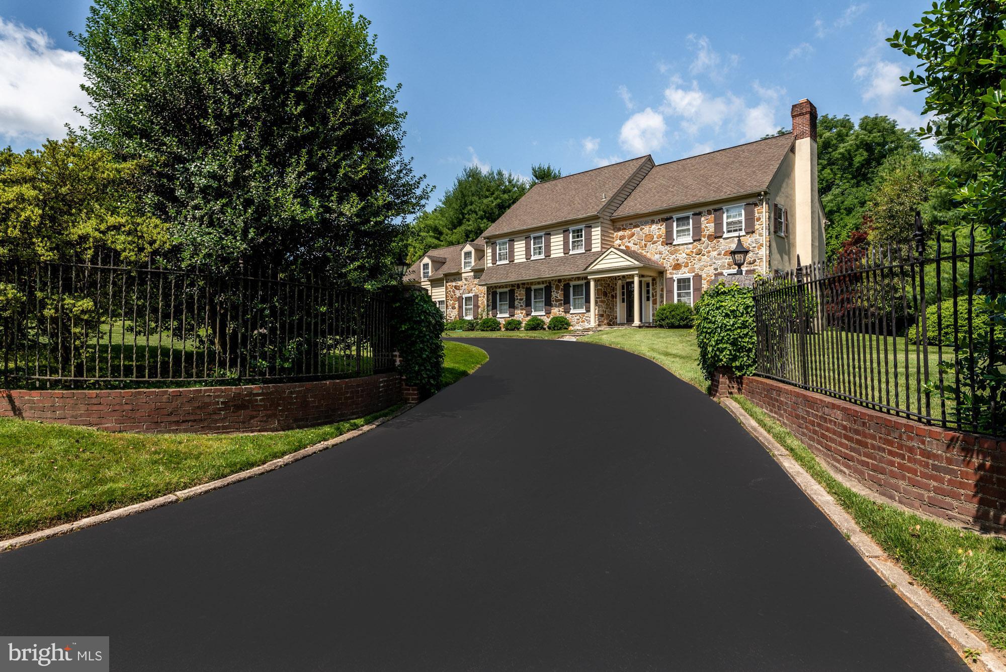 Surrounded by lush greenery on an expansive lot, this home captivates all with its remote privacy and impeccable details throughout. Located in the prestigious North Side of Bryn Mawr, this stately 5 bedroom, 4.2 bathroom Colonial has everything you need to live a lavish lifestyle.
As you drive up the long, winding driveway, you are welcomed to the property by an extravagant front yard with manicured hedges and vibrant foliage in your front gardens. A custom stone walkway leads to a tasteful modern wooden front door at the grand main entrance. Entering the home, you are greeted by a vast center hall that elegantly guides you throughout the main floor. Rich hardwood flooring, oversized windows, multiple warm fireplaces, and ultramodern design elements can be found throughout the main floor. Whether hosting a dinner party in the formal dining room, relaxing in the sun-soaked living room, or reading next to the fireplace in the study, you will immediately feel at home. The gourmet kitchen was built for a chef with its stainless steel appliances and sleek granite countertops. The main floor is complete with a sizable mud room that enjoys access to the attached two-car garage, and two half baths.
All five bedrooms are spacious and bright, including the elegant primary suite, which features an immense walk-in closet and a luxurious ensuite bath. The remaining four bedrooms can be found on the second floor, two equipped with their own ensuite baths, and the final two bedrooms sharing a convenient hall bathroom.
The commodious lower level of this home is patiently waiting to be fashioned to the buyers taste. With plenty of space to be transformed into an in-home gym, a guest suite, or second living area; this lower level has unlimited potential. This home is complete with a custom stone patio and overhang that overlooks yards of rolling green grass and vibrant garden space in the picturesque wooded rear yard.
Located in the highly sought after town of Bryn Mawr on the distinguished Main Line, this home sits within a few mile radius of countless golf courses, restaurants, and major shopping. 512 Fishers Road finds itself in the Lower Merion School District, with many prestigious private schools in the area as well. Conveniently located near Route 30, with easy access to I-76, this home makes commuting a breeze.
Please find masks and booties at front door. Please make sure to wear both.