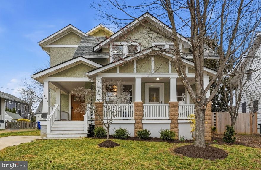 Tucked away on a quiet street in Arlington’s desirable Lyon Village neighborhood, this classic bungalow blends timeless charm with thoughtful contemporary updates and cutting edge energy efficiency. A welcoming wraparound front porch sets the tone for this inviting home. >> The open concept main level is designed for everyday living and entertaining, featuring custom solid maple hardwood floors and a beautifully appointed kitchen with solid teak cabinetry, gas cooking, and a farmhouse sink. The main living area includes a cozy window seat and custom built-ins for added warmth, character, and storage. Elegant mahogany French doors bring in natural light and connect the living spaces to the outdoors, opening to a spacious wood deck that extends the living area and overlooks a private, fully fenced backyard. A cozy sitting room with a fireplace opens to the front porch. >> Upstairs, an expansive primary ensuite offers cathedral ceilings, a spacious walk-in closet, charming Juliet balconies, and a spa inspired bath with dual vanities, a frameless glass shower, and a freestanding soaking tub. Two additional bedrooms share a hall bathroom, and a versatile fourth room provides flexibility for a private office or nursery. >> The lower level includes a large recreation room, an in-law suite with full bath and kitchen, and an oversized laundry area, making these spaces both functional and comfortable. Dual staircases provide convenient access from both the living room and kitchen. >> Outdoors, the fully fenced backyard creates a private setting for relaxing or play, and the extended driveway offers parking for multiple vehicles. The home is powered by a high performance geothermal heating and cooling system supported by three deep wells, delivering clean, quiet operation while reducing energy costs by approximately 50%. >> Just blocks from the vibrant heart of Clarendon — with shops, dining, and Metro access — this exceptional home combines timeless design, modern efficiency, and an unbeatable location.