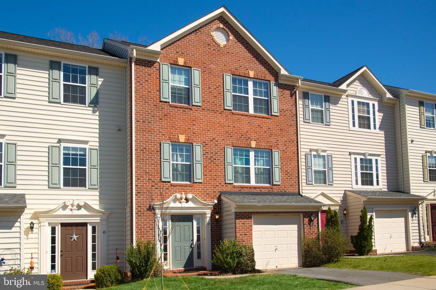 Beautiful brick front, 3 level townhome ! 
The Main level boasts an Eat-In Kitchen with Island, stainless appliances, Granite countertops, maple cabinets and gorgeous Hardwood Floors, as well as a large living room.
Owners Suite with walk-in closet and full bath with dual vanities. Two additional bedrooms on third level, linen closet and full bath. 
Finished lower level with large Recreation Room with Walkout Patio, Half Bathroom and entryway coat closet. 
Deck with wonderful view of wooded area great for entertaining. 
The Spring Creek community offers plenty of amenities: Gated Entrance, Pool, Club House, Play Area and more and is very close to Shopping, Dining, Groceries and more - plus just a Quick Commute to Charlottesville!