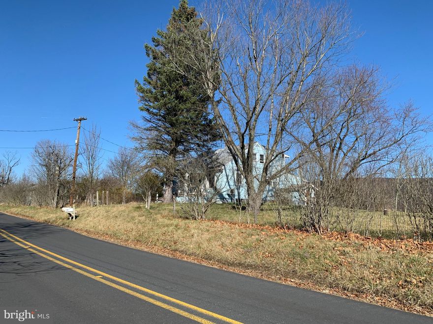 Selling 1.5 acres with house and buildings for storage and parking. It has well, septic and electric. Very nice level lot with partial fencing, Lot has views of the Sleepy Creek Mountain and the Cacapon Mountain. This is a great location in the southern part of Morgan County. Lot has some mature trees, shrubs, and flowers with a raised garden area. The entire property is sold as is, where is and as existing. This house has not been lived in since 2015. There are interior pictures of the house available in the listing documents taken from an appraisal done in 2016. There is also a Hold Harmless Agreement that must be signed by anyone entering onto the property.