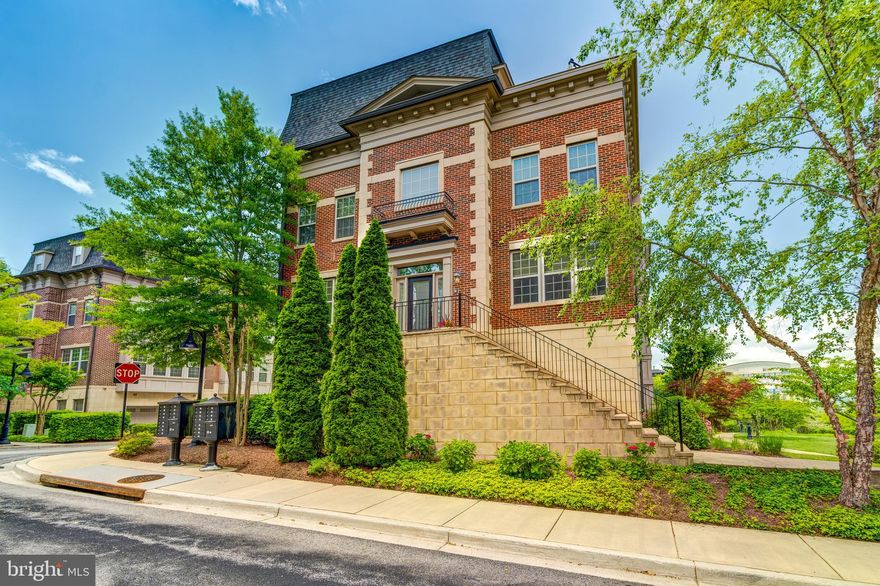 *****PRICE IMPROVEMENT-$899,900!*****


Step into this stunning end-unit brownstone, thoughtfully designed with 4 bedrooms and 4.5 bathrooms, where comfort and elegance meet modern living. Upon arrival, the grand entryway welcomes you with 9-foot columns, leading into a bright and inviting living space centered around a cozy fireplace. Adjacent to this is your gourmet eat-in kitchen, complete with a stylish island, granite countertops, high-end stainless-steel appliances, including double wall-mounted ovens, and a state-of-the-art Bespoke 4-Door Flex refrigerator with AI Hub and Vision technology.
On the third level, you'll find your serene primary suite featuring an en-suite bathroom with dual vanities, a luxurious soaking tub, and a separate shower. A secondary bedroom is conveniently situated nearby, with the laundry room, equipped with GE front-loading washer and dryer, perfectly positioned between.
The top level offers a versatile loft area with a dual-sided fireplace and a wet bar, enhanced with a wine fridge and under-cabinet lighting. This space is ideal for a wide array of uses, whether you envision a library, podcast studio, playroom, fitness area, or a combination of them all. On one side of the loft is the third bedroom, complete with its own en-suite bathroom, while on the other, you'll discover your private rooftop deck. This expansive outdoor retreat boasts breathtaking views of the Potomac River, MGM, and Old Town, making every day feel like a vacation.
This exceptional home is elevated further with premium upgrades throughout, including a whole-home water filtration and softener system, built-in speakers in four areas (loft, rooftop deck, kitchen, and living room), a four-level intercom system, new kitchen tile flooring, and a Geothermal hot water heater. The two-car garage is equipped with EV Lectron Home Level 2 charging stations, and the driveway accommodates two additional vehicles.
Situated within walking distance of National Harbor's shops, dining, and entertainment options, as well as courtyards, dog parks, jogging and biking trails, and water taxi access to The Wharf and Old Town, this home offers both convenience and luxury. Move-in ready and impeccably maintained, this end-unit brownstone with unparalleled views and upgrades is waiting to welcome you home.