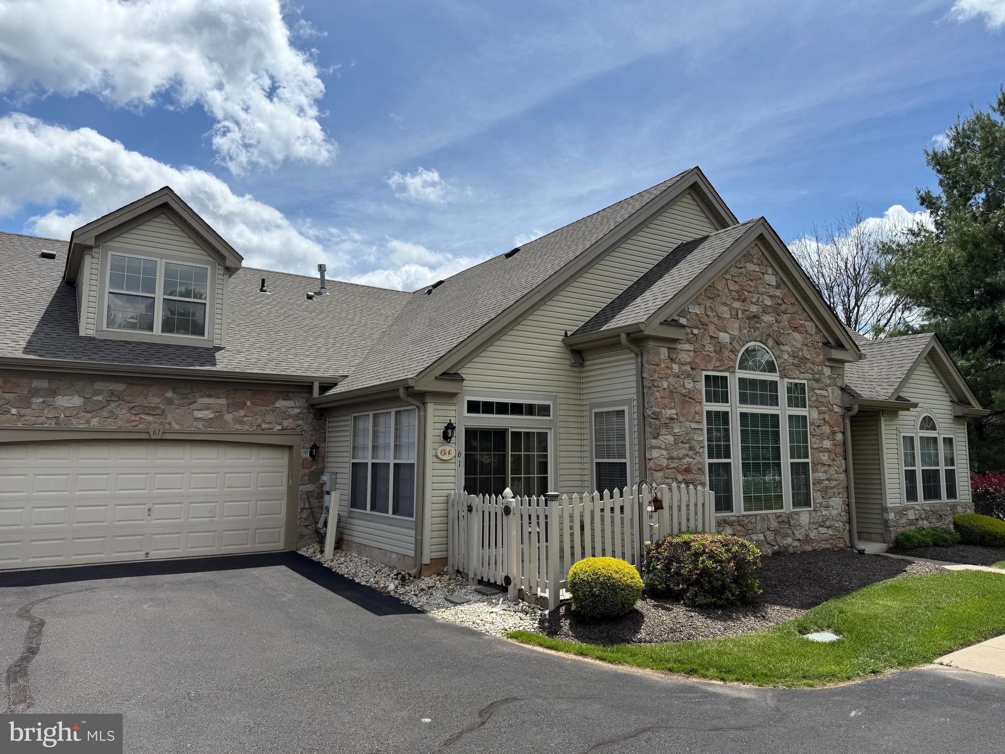 Welcome home!
Legacy Oaks at Northampton is an desirable 55+ community located in historic Bucks County.
This community features low-maintenance homes, in a private setting. The beautiful exteriors include stone accents and covered entrances. Being the largest of three models, this home offers 3 full bedrooms, 3 full bathrooms, a den and an oversized two-car garage. This owner chose every builder upgrade available!
As you enter this grand home, you'll be greeted by an open floor plan and an abundance of natural light. The impressive living room boasts, 14 foot ceilings, large windows and it flows seamlessly into the dining room and open kitchen.
Kitchen has 42” wood cabinets, Upgraded countertops, tiled backsplash, newer appliances, and cozy breakfast nook. The sunroom also has vaulted ceilings and an abundance of windows, with sliding glass doors to the paver patio with privacy picket fence. Great for enjoying your morning coffee or evening barbeque.
The primary bedroom is designed with trayed ceiling, two walk-in closets, dressing area, and full bathroom with walk-in shower, double vanity, and toilet closet.
Bedroom #2 is generoudly sized. First floor laundry room with wash sink and comes equipped with many overhead cabinets for extra storage.
The guest suite is positioned over the two-car garage for privacy, offering a very spacious bedroom, sitting area, office space and full bathroom. An expanded side-yard is a premium. Great location with nearby town featuring many shops and restaurants. Don't miss this one!