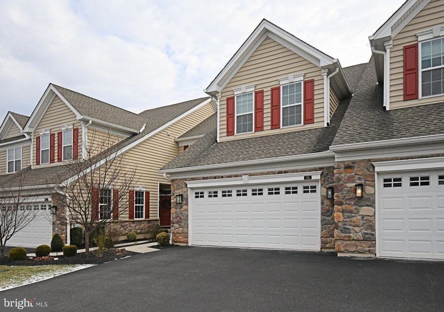 Welcome to this exceptional townhome in the highly desirable White Springs at Providence community, located in the no–age-restriction section and offering privacy rarely found in townhome living. This beautifully maintained home does not back to any other homes, providing a peaceful, private setting and enhanced outdoor enjoyment.
This home features 3 bedrooms, 2.5 baths, a large finished walk-out basement, and an attached two-car garage equipped with an electric vehicle charging station. Thoughtful bump-outs on multiple levels create expanded living areas and an open, airy feel throughout.
The main level showcases hardwood floors, a bright and open layout, and a well-appointed gourmet kitchen featuring granite countertops,  upgraded appliances, gas cooktop, stacked wall oven & microwave, custom range hood, and ample cabinetry. A breakfast room and formal dining area provide flexible entertaining and everyday dining options. The breakfast room has sliding glass doors that lead to a very large composite deck backing to a walking trail.  Back inside, the spacious great room features a gas fireplace with a custom window above, flooding the space with natural light. A study and powder room complete this level. 
Upstairs, the primary suite is a true retreat, featuring cathedral ceilings, two walk-in closets, and a luxurious bath with soaking tub, walk-in shower, water closet, and double sinks. The second bedroom is exceptionally large with cathedral ceilings, while an additional bedroom, full hall bath, loft area, and conveniently located laundry room complete the second floor.
The finished walk-out basement offers additional living space—perfect for a media room, guest suite, gym, or multi-generational living. The home also features two-zoned heating for added comfort and efficiency and has been very well maintained.
Residents enjoy access to a resort-style community pool and clubhouse, along with tennis courts, a fitness center, and social spaces. Ideally located just minutes from Providence Town Center’s shopping, dining, and entertainment, with super easy access to Route 422 and major highways.
