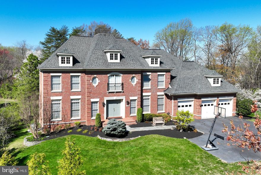 **On weekdays, the showing is scheduled from 10 AM to 2:30 PM, but we'll make an effort to accommodate requests outside of these hours with ample notice.**  Experience the ultimate in luxury living with this exquisite WCI Renaissance Grand Monet residence, showcasing a 4-sided brick exterior and a spacious 3-car garage. A magnificent flagstone pathway welcomes you into a jaw-dropping 2-story foyer, adorned with a chandelier lift motor that instantly captures the essence of the home's luxurious features. Bask in the natural light flooding the expansive great/family room, thanks to extended circle-top windows and motorized window shades. Dual staircases with elegant wrought iron railings add a refined touch. The stunning sunroom, complete with a pitched roof, and the oversized deck create the perfect backdrop for outdoor entertainment. Charming French-style glass doors grace the dining room, living room, and library, while a wood-burning fireplace with a burner infuses warmth and coziness. The custom signature kitchen is a chef's paradise, boasting 42-inch raised Decora Glazed and Cherry cabinets, an oversized island with a sink, two 36-inch built-in side-by-side refrigerators, and a 48-inch professional-grade stainless steel dual fuel range. The butler's pantry, outfitted with custom cabinets, a wine cooler, and a sink, and the bespoke backsplash with a pot filler make entertaining a breeze. Step into the lavish owner's suite, featuring a double door entry, a coffered ceiling, and a sitting area with a gas fireplace. The dual spacious walk-in closets with built-ins and opulent marble throughout the master bath, including an oversized heated soaking tub and massage showerheads, elevate the comfort and luxury of this haven.  Additional highlights include a 100-gallon quick recovery hot water heater, pre-wiring for generators, and an integrated Niles sound system. Recessed lighting and Oak hardwood flooring flawlessly complete the home's stunning aesthetic.  The recently fully finished basement offers a master suite with a soaking tub, shower, and walk-in closet, alongside a secluded media room featuring a 150-inch screen, 11.2 sound system, and power recliners with butt shakers. (All the equipment in the media room conveys, including screen, projector, and stereo systems.) The home also boasts a new A/C compressor (main level), a new dishwasher, updated bathrooms, pre-wiring for two 60 AMP power lines for the garage, and a rough-in for a wet bar in the basement.  Don't miss the chance to call this house your home, complete with a new flagstone walkway installed in 2022, further enhancing the charm and appeal of this extraordinary property. The seller has invested over $200K in the deck/sunroom, lower-level outdoor storage, and finished basement.