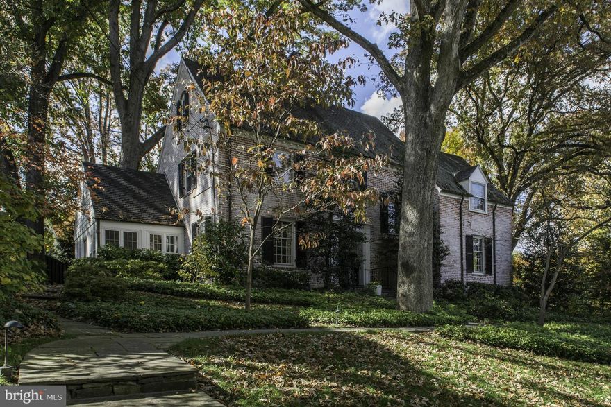 Located on one of DC's most coveted streets, Lowell Lane, this beautiful 4BR white-washed brick colonial has a newly-renovated eat-in kitchen, formal DR, den with fpl, gracious LR and adjoining sun room - all on the main level. Nicely finished lower level with family room, laundry room, extra storage, and large 2-car garage. Kitchen and sun room open onto rear garden and terrace.