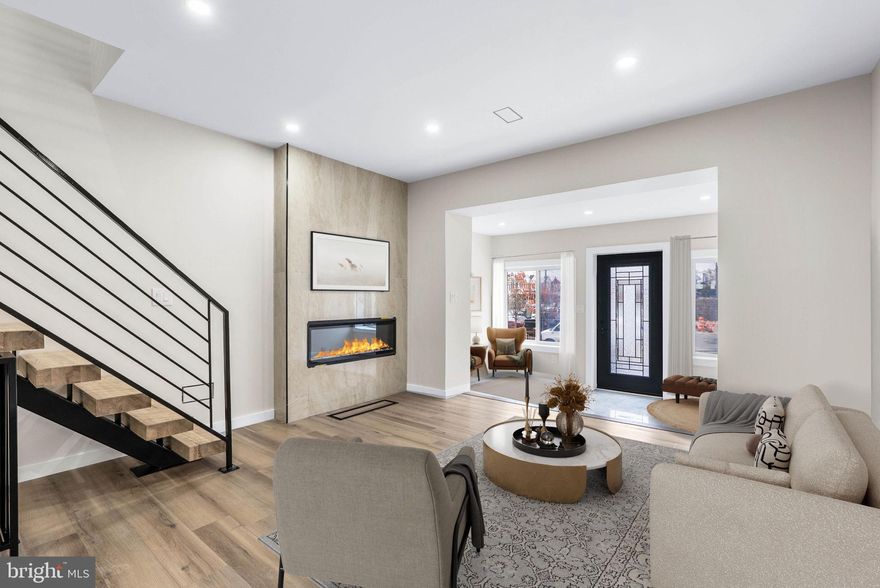 Welcome to 5511 Pine Street, a beautifully reimagined 3-bedroom, 2-bath home located in the heart of growing West Philadelphia. The developer left no stone unturned in creating a space that blends modern luxury with everyday comfort.   Step inside to discover gleaming pine flooring, elegant French doors, and floating stairs that set the tone for sophisticated design. The spa-inspired bathrooms feature a jacuzzi tub, double vanity, and Bluetooth-enabled accents, offering the perfect retreat after a long day. The chef’s kitchen is a true showstopper, boasting quartz countertops, a glass tile backsplash, soft-close cabinetry, and stainless steel appliances—ideal for entertaining or quiet nights in.  Enjoy additional living space in the finished basement complete with a laundry area, and take gatherings outdoors to your private rear yard perfect for relaxing or entertaining guests.  This home is equipped with energy-efficient features including a SEER-rated HVAC system and tankless water heater, combining comfort with sustainability.  Located near major universities and hospitals, this home offers unbeatable convenience with a Walk Score of 70 (Very Walkable), Transit Score of 73 (Excellent Transit), and Bike Score of 92 (Biker’s Paradise).  Don’t miss your chance to own this modern gem—complete with a 10-year tax abatement and eligibility for special financing programs. Schedule your showing today! (Some photos are digitally enhanced to provide a vision of a furnished home).