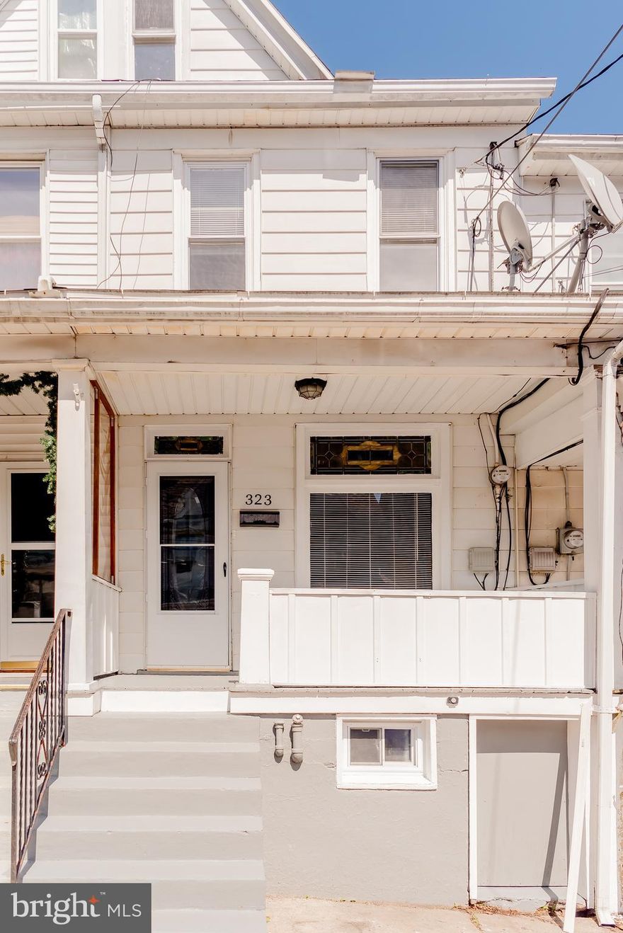 Welcome home to 323 N Columbia Street - your sophisticated yet affordable new home! Outside find a quaint front porch which has been repainted and is ready for your rocking chair. Entering in the front door, you'll notice solid surface floors running through the living and dining room, and an abundance of recessed lighting. In the kitchen, you'll find new cabinetry with tiled backsplash and granite countertops. Off the kitchen find a rear deck and yard, that awaits you and your grill. Upstairs, find 3 bedrooms with new carpeting, and a hall bath. The 3rd floor is fully finished and also has new carpeting. The basement has been tastefully refreshed with new paint. All this, cheaper than rent!