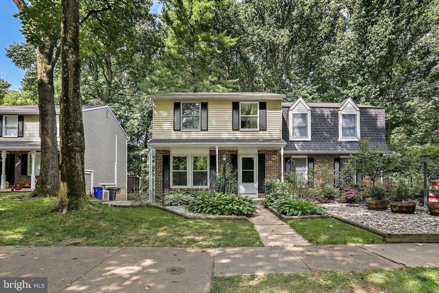 Offer Deadline - seller requests offers to be submitted by 5:00 pm Friday, July 12.     This updated end-of-group duplex in Owen Brown Village, Columbia, has over $51K in upgrades! The main level features an oversized living room with abundant natural light and a newly updated kitchen (2024) with white shaker cabinets, quartz counters, stainless steel appliances, and laminate flooring. The adjacent dining room has a slider to the recently stained deck overlooking wooded views, perfect for entertaining. A convenient half bath with an updated light fixture completes this level. Upstairs, the owner’s suite has spacious closets, a newly installed ceiling fan, and an attached full bath. Two additional bedrooms and a full bath with updated tub surround & light fixture are just down the hall. The finished lower level offers a large rec room with a walkout slider to the patio and private backyard. A laundry area, extra storage, and rough-in plumbing for a full bath complete the lower level.  Located just minutes from shopping, restaurants, and trails around Lake Elkhorn, and close to downtown Columbia, this home offers quick access to Route 29, 32, 100, and 95, making it ideally situated between Baltimore and Washington. The home features new patio sliders, a renovated kitchen, fresh carpet and paint throughout, and a power-washed exterior in 2024. Additionally, major updates include a new roof in 2022, an HVAC system in 2019, and a water heater in 2018 just to name a few. Welcome home!