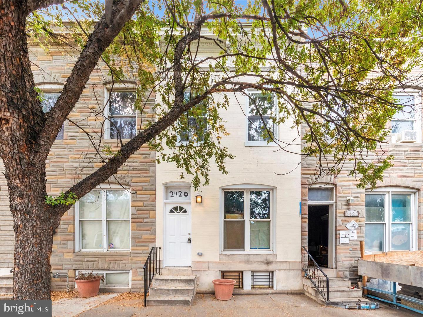Welcome to this stunning newly remodeled row home, offering the perfect blend of modern updates and classic charm!