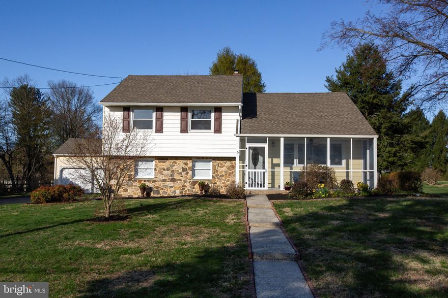 Spend sunrises with a cup of coffee on your screened-in front porch and sunsets on your private deck enjoying the serene, one-acre backyard! Welcome to 6 Vernon Lane, an inviting and sunny home set on a gorgeous level lot in the highly-sought after Great Valley School District. This charming three bedroom, two and a half bathroom split level is an excellent value in an unbeatable location, just minutes from the phenomenal shopping, restaurants, and entertainment of Malvern. 6 Vernon is the perfect choice for those who want the open space, privacy, and tranquility of Chester County, while still maintaining quick and easy access to the city via the nearby Malvern train station. 

As you enter the home, you’re greeted by the bright and welcoming atmosphere, a result of the screened in front porch and the large bay window framing the entryway. The floorplan is perfect for everyday living as well as hosting friends and family: with a semi-open layout that flows well into each room while still feeling cozy and classic. On the next level, find three spacious bedrooms including the primary suite, and a full hallway bathroom. Up four more stairs find a second full bathroom and an unfinished space which many in the neighborhood convert to a primary suite. A half bathroom with laundry on the lower level provides this home with an added convenience. Head outside to your charming deck, shaded by a lovely pergola, where you can admire your tree-lined, level yard, the perfect place for recreation, relaxation, and the occasional soiree. Practicality hasn’t been forgotten, though, with garage space for up to three cars. The detached garage and garden house both offer power and lighting, meaning even more room which can be used as storage or hobby space. 

This is an unbeatable location for anyone seeking a blend of accessibility and open space. Malvern’s bustling town is mere minutes away, with popular shopping, restaurants, and bars, including Brick and Brew, Buttery Bakery, and Kimberton Whole Foods. Children can walk or bike to well-regarded Sugartown Elementary School. Not to mention the excellent commuter options, including the Malvern train station which can easily bring you into Center City Philadelphia via the Regional Rail and New York City via Amtrak. You won’t have to sacrifice proximity to open space, though, with Radnor Hunt, scenic parks and trails, and golf courses like White Manor, Applebrook, and Waynesborough, all nearby. This home is an excellent opportunity for investment, surrounded by phenomenally renovated and well-cared for homes across the quiet neighborhood. Move right in and enjoy the home as it is, or renovate and expand it to suit your particular needs. The possibilities are endless!