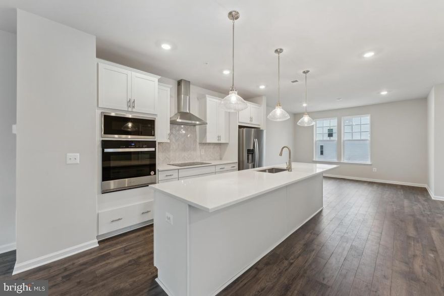 IMMEDIATE DELIVERY - Stunning New END Townhome in the Heart of Damascus, MD! Welcome to your dream home! This beautifully designed 4-bed, 3.5 bath townhome offers the perfect blend of modern comfort and convenience. Nestled in a sought-after community, this home features an open-concept floor plan, fabulous kitchen with quartz countertops, stainless steel appliances, luxury vinyl plank flooring, and a spacious primary suite with a walk-in closet and spa-like bath. Private backyard opens to common area. Enjoy low-maintenance living with lawn care included, and take advantage of nearby amenities, including parks, shopping, dining, and top-rated schools. Commuters will love the easy access to major highways, making travel to DC, Rockville, and beyond a breeze! Don’t miss this opportunity—schedule your private tour today! On-Site Sales Office Hours: Monday-Saturday 10am-6pm; Sunday 12pm-6pm
