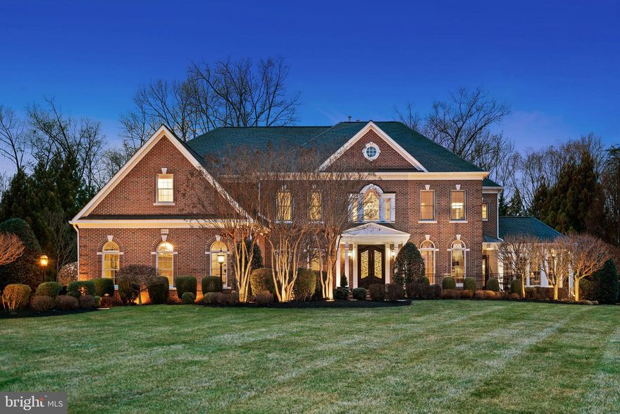 ONCE in a LIFETIME OPPORTUNITY!  The Estates of Piedmont’s ICONIC and COVETED 5900 Flynnsbrooke Terrace in Haymarket’s Award-Winning Gated Golf Resort Community. This STATELY 6BR/8 Bath nearly 9000 sq.ft., ALL BRICK Home on 1.37 LUSH PREMIUM Acres is situated on one of the communities most DESIRABLE & COVETED lots.   LOADED with EXTRAS and UPGRADES!   These SELLER’s have invested over $500K from the Covered Pavilion with Stacked STONE Wood Burning Fireplace and Outdoor TV Hookup, to the LUXURIOUS Ritz Carlton Inspired WET Bar in the basement that includes a Sub Zero 86 Bottle Temperature Controlled Wine Fridge and Dual REFRIGERATOR Drawers, Additional Beverage Fridge, Dedicated Ice Maker, Dishwasher, Built-In TV and Soft Close UPGRADED Cherry Cabinetry! Down to the CUSTOM GARAGE Flooring and Cabinetry System this ESTATE HOMES features are UNMATCHED!  The 9+ Foot Ceilings throughout all levels make this SWEEPING OPEN Floor Plan an absolute DIME.  The Light Filled and EXPANSIVE Great Room has been extended 4-Feet which extends all 3 levels includes COFFERED Ceiling, Gas Fireplace, GRANDIOSE Chandelier, Built-In Home Media Console Center, and Rear Owner’s Staircase.  The Great Room is OPEN to the Chef’s GOURMET Kitchen w/ Maple Decora Cabinetry and COMMERCIAL GRADE Appliances like Sub Zero and Thermador.   The SOLARIUM off the kitchen includes heated floors and direct access to the IMPRESSIVE Outdoor Living, Covered Patios and Water Features.  The Main Level includes 2 Half Baths, Arrival Room with Heated Floors, Main Level Study, Parlor, Embassy Sized Formal Dining Room w/ Rear Foyer and Butler’s Pantry w/ Additional Beverage Fridge and Granite Wet Bar.  A light filled Side Conservatory on the NORTH WING is perfect to COZY up to READ or RELAX After Dining.   All SPACIOUS UPPER Level Bedrooms include Walk-In-Closets and EN-SUITE Full Baths.  The Primary Suite includes TRAY Ceiling, Sitting Room, Outdoor Covered Balcony, Custom Walk-in Closet, Dual Granite Vanities, Heated Floors, Soaking Tub and Shower w/ Dual Shower Heads.  You will surely be pleased with the CONVENIENCE of the EXPANDED UPPER LEVEL Laundry Suite with New Washer/Dryers (2019). The 3,000 sq. Ft. Finished DREAM Basement includes a Large Media/TV Room, Billiards Area, 6th Bedroom, Wine Tasting Room, Home Gym/Hobby Rooms and 2 Full Baths.  EXCEPTIONAL outdoor living with METICULOUS Landscaping, 19 zone Irrigation System, Covered Walk-Up, Multiple Patios, Pavilion, and ORNAMENTAL Exterior Home and Landscaping Lighting in front and back.  Complete Interior/Exterior Audio System.  Buyer Peace-of-Mind w/ 4-Zone HVAC  (2012/2015) .  Added insulation on all 3 levels. New Roof (2016), Water Heater (2013), pre-wired for BACKUP Generator, Multiple Redundant Sump Pumps w/ Battery Backup.  If you believe you deserve the finest, then this OPPORTUNITY is for you!