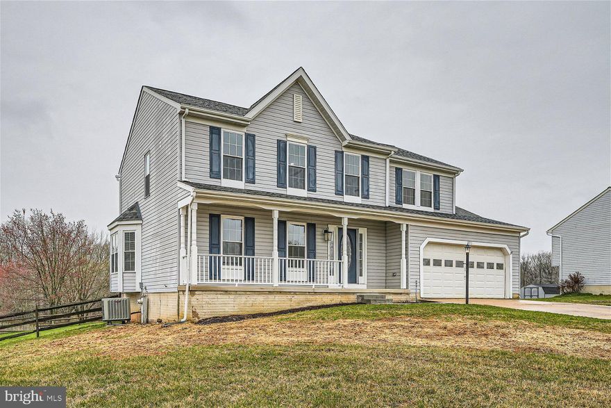 Price Improvement! Newly renovated 4BR/2.5BA Colonial on a sprawling lot in the quiet neighborhood of ____.  No attention to detail was missed during the transformation of this stunning home.  Park in the double driveway just outside the two car garage and make your way to the covered front porch, and step into your forever home. Throughout the main floor are luxury flooring, crown moldings, and tons of natural light. Enter into the spacious living room and step through into the heart of the home, the kitchen and open concept dining and family rooms.  The kitchen is spectacular featuring plenty of stark white cabinets finished to the ceiling with crown moldings, a separate pantry closet, stainless steel appliances including a slide in electric range, sleek quartz countertops with a subway tiled backsplash, a stainless sink under a window, and a large island with blue lower cabinets, breakfast bar seating for four, and a chandelier above.  The focal point in the spacious family room is a whitewashed brick wood burning fireplace with a wood mantel.  A half bath and access to the two car garage completes the main floor.  The newly carpeted second floor offers three identical sized secondary bedrooms all with double closets, a new full bath, and a grand primary owners suite.  The primary boasts vaulted ceilings, a large walk-in closet, and an ensuite featuring a double sink vanity.  The lower level is finished adding additional living space, storage, laundry, and a walk-out to the yard.  From the kitchen step outside to a newly constructed wood deck that overlooks a yard filled with a carpet of green space and a large storage shed.  This home is ideal for any new homeowner and offers so many upgrades throughout.  Imagine all this and in close proximity to shopping, restaurants, and commuter routes.  

ASK ME HOW THE BUYER CAN QUALIFY FOR AN EXTRA $28,000 TO PURCHASE THIS HOME!