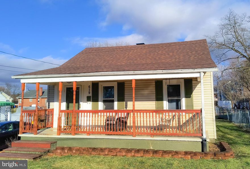 This charming 2 bedroom, 1 bath home has so much to offer. Located in town, close to all the amenities.  Solid hardwood floors throughout the living room and bedrooms. Spacious front porch and rear deck for enjoying the fresh air.  Main level washer and dryer for your convenience. New in 2020: Vinyl plank flooring in kitchen and dining room; New roof; New plumbing; New Electric panel; New heat pump with propane backup!  Bathroom recently renovated in 2019.  The basement has some storage and the potential for a small workshop.