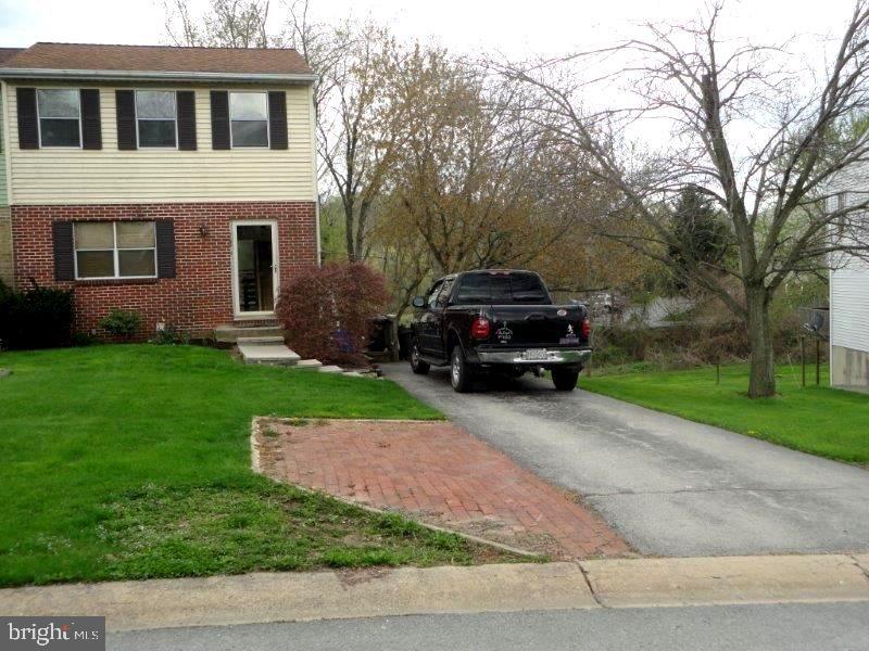 WATER, SEWER AND TRASH IS $102 MONTHLY. GREAT STARTER HOME, 3 BRS, 1 FULL AND 2 HALF BATHS, NICE FAMILY RM WITH SLIDING GLASS DOORS TO COVERED PATIO, DECK OFF OF DINING AREA, CERAMIC TILE IN KITCHEN, OFF STREET PARKING - BLACK TOP DRIVEWAY, HAS A BREAKFAST BAR.