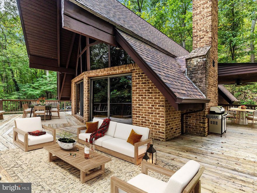 Tucked away on over 5 private acres, this chalet-style retreat feels like living in your own treehouse. Soaring ceilings, expansive windows, and skylights bathe the open interior in natural light, highlighting the warmth of hardwood floors and a striking fireplace centerpiece. The wraparound deck is perfect for morning coffee or evening sunsets, surrounded by nature. The oversized, detached two-car garage offers endless possibilities for storage, projects, or tinkering. Inside, you’ll find eclectic charm blended with modern updates: a beautifully refreshed kitchen featuring stainless steel appliances and granite countertops. Whether you’re seeking a private escape or a home with character, this property delivers both. Enjoy rustic serenity without sacrificing convenience—just 15 minutes to Middletown’s shops and dining, and within the desirable Middletown school district. A rare opportunity to own a one-of-a-kind home that truly captures the best of mountain-style living.