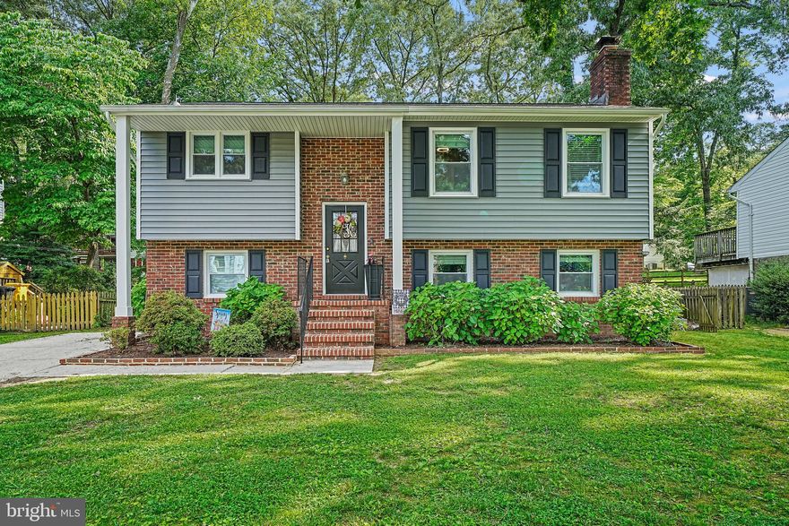 Charming Chartridge split foyer with stunning kitchen renovation!  This 4 bedroom, 2.5 bath home had several major upgrades over the last several years.  The owner completed a stunning kitchen renovation in 2020 that includes all new cabinets, countertops, appliances, and lighting.  New HVAC and new windows were installed in 2017.  New sliding glass doors and a fireplace insert were installed in 2018.  Main-level luxury vinyl tile and attic storage were installed in 2019.   A new water heater was installed in 2020.  A new roof, siding, and additional insulation were added in 2021.  New carpet throughout the house in 2024, along with a renovated lower level half bath.  The Chartridge community also offers a community pool membership WITH your HOA dues, a fantastic value for the cost.  Professional photos of the entire interior and exterior should be available before the weekend arrives.  See it before it's gone!