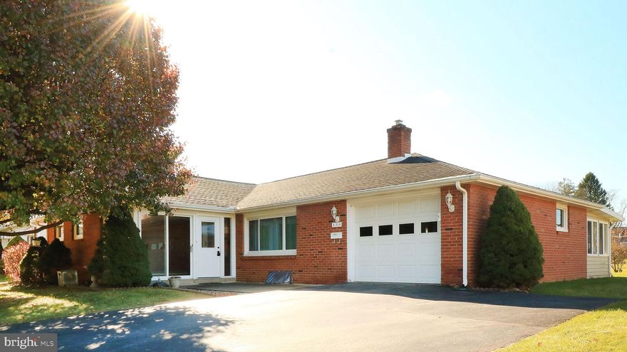 Sturdy and full of charm, this all-brick ranch in a classic Bellefonte neighborhood has been lovingly maintained, with the seller completing recent facility updates throughout the home. Situated on a .24-acre lot, the property is ideally located near downtown historic Bellefonte and the local schools, with easy access to State College.

From the moment you arrive, the home's inviting curb appeal stands out with mature landscaping and a welcoming enclosed front porch. Inside, the spacious living room features hardwood flooring and a large picture window that fills the space with natural light. The eat-in kitchen offers solid wood cabinetry, appliances, garage/rear patio access and pantry storage.

The home features three bedrooms, all with hardwood floors. One is currently being used as a laundry room but all three have close access to a full bathroom. Downstairs, the finished basement provides additional living and workspace with a large rec room, a home office, additional laundry area with utility sink and workshop.

A cozy three-season porch overlooks the backyard, creating a wonderful place to relax or entertain. Additional highlights include solid wood doors and trim throughout, central air conditioning, an oversized shed, a one-car attached garage, and Bilco doors offering convenient basement access to the backyard.

Whether you're purchasing your first home or looking to downsize, this well-cared-for property offers comfort, functionality, and a fantastic location on a beautiful street in Bellefonte.