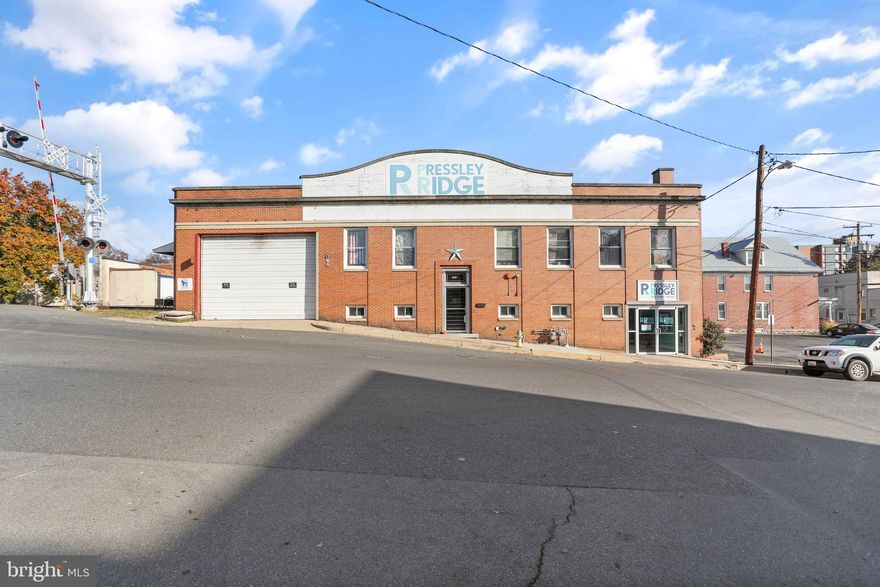 CALLING ALL INVESTORS: check out this incredible opportunity to own a commercial gem in the heart of the tri-state (MD, WV, PA) area! This is a versatile and strategically located property that provides an excellent opportunity for your business needs and your investment portfolio! The combination of a spacious warehouse and ample office space provides an ideal place for a wide range of businesses OR multiple tenants! The first floor includes 10+ offices, a reception area, private storage/file rooms, and a fully functioning kitchen and break area! Also on the first floor is a large conference room - the perfect place for presentations and team collaboration! On the second floor, you'll find 2 offices and a large warehouse with a loading dock for easy logistics to assist your business! Whether you're in logistics, manufacturing, or require an office environment, this property can be customized to suit you and your needs to take your business to the next level! All of this is strategically located  just 2 hours from Baltimore, D.C., and Pittsburgh and right next to very busy Interstate 68, making it convenient to get to and ideal for advertising purposes! Don't let this opportunity slip away - come see it for yourself today!
