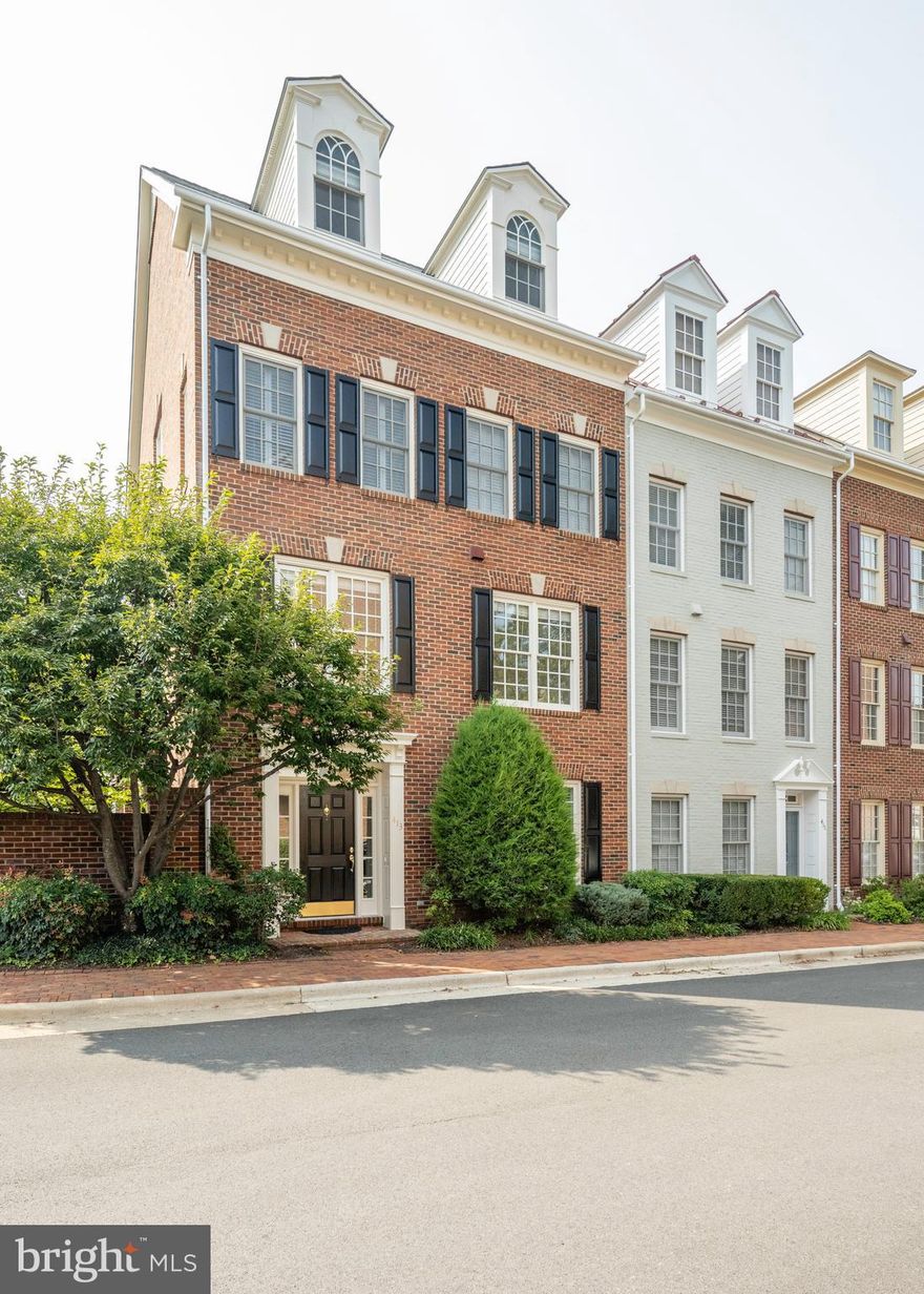 Experience the pinnacle of modern living with this exceptional 4-level end-unit home in the sought-after Old Town Village. Nestled in the heart of Old Town Alexandria, this stunning 2,771 sq. ft. residence offers a seamless open living area—perfect for contemporary living and entertaining. Priced at $1,500,000, this home represents outstanding value and is a true gem in Old Town Alexandria.

Move-in ready, the home invites you to add your personal updates. Enjoy the elegance of custom moldings, shutters, two gas fireplaces, built-in bookcases, and a convenient 2-car garage. The kitchen, adorned with elegant white cabinets and granite countertops, opens to both the family and living rooms. Relax by the cozy corner gas fireplace in the family room or host memorable gatherings on the expansive deck off the family room. The lower-level library/office, enhanced by custom built-ins, French doors, and a gas fireplace, provides a tranquil spot for work or relaxation.

The luxurious primary suite offers a spa-like bath with a soaking tub, separate shower, and a massive walk-in closet. Each bedroom features a private bath, ensuring comfort and privacy for all.

Immerse yourself in a community that beautifully blends historic charm with modern amenities. Old Town Village is a true jewel with a gated entrance and amenities such as a saltwater pool, exercise room, hot tub, party room, library, and tot lot. Its prime location in the heart of Old Town Alexandria places you within blocks of shops, fine dining, Metro, Whole Foods, and the Waterfront. Enjoy quick access to the Pentagon, Andrews AFB, Ft. Belvoir, and major highways 395, 295, and the GW Parkway—putting every convenience at your fingertips.

Don't miss the chance to see this beautiful home. This entertainer's dream residence is an exceptional opportunity, ready to welcome your personal touch.