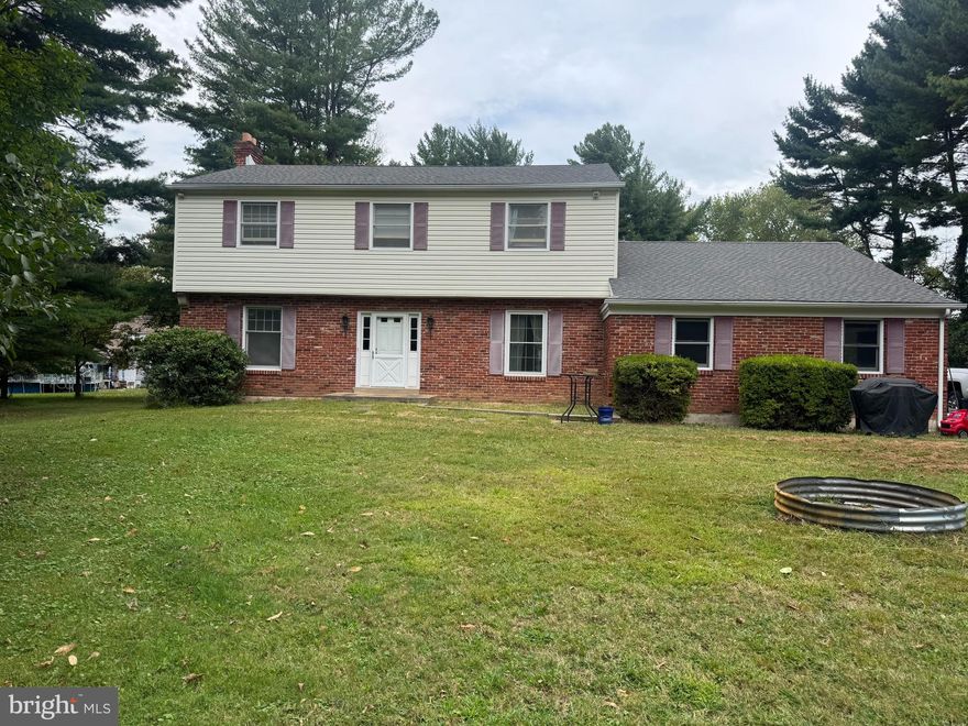 Schedule your tour today, Call Jill. Over 2800 sqft of living space.  Just ender 2 acre lot! 4 Bed 2.5 bath. Updated kitchen with granite counter tops,  subway tiles and stainless appliances.  Updated en-suite bathroom with frameless glass doors. Large en-suite  closet. Hardwood floors throughout main and upstairs! MUST SEE IN PERSON SCHEDULE A TOUR!

Enjoy the flexibility of a partially finished basement, perfect for home offices or a rec space. A rare find, the property includes both a 2-car attached garage and a 2-car detached garage/workshop — ideal for contractors, hobbyists, or car enthusiasts.

Surrounded by mature trees and nature, this private retreat is just minutes from town, offering the perfect blend of tranquility and convenience. Call Jill to schedule your showing today!