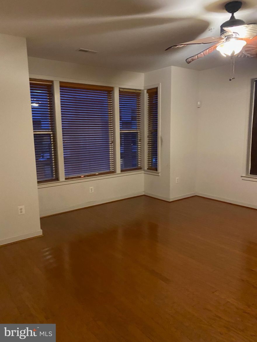 Bright and spacious contemporary condo.  This stunning condo boasts abundant natural light with a spacious open layout, garage parking, and a second-level deck. Enjoy the convenience of a prime location. with breathtaking city views. Walk to JHH, close to Fells Point, Canton, and all that Downtown Baltimore has to offer.