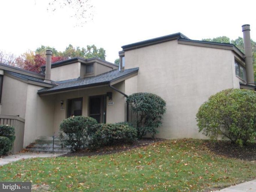 Absolutely stunning two level condo!  Completely updated kitchen and baths.  New beautiful, resilient plank flooring on main level. Vaulted ceiling and warm fireplace in family room.  Pass-through opening from kitchen to dining room.  Cozy fenced in patio offering plenty of space for grilling and dining as well as privacy.  Convenient to shops, college, hospital and transportation. A must see!!