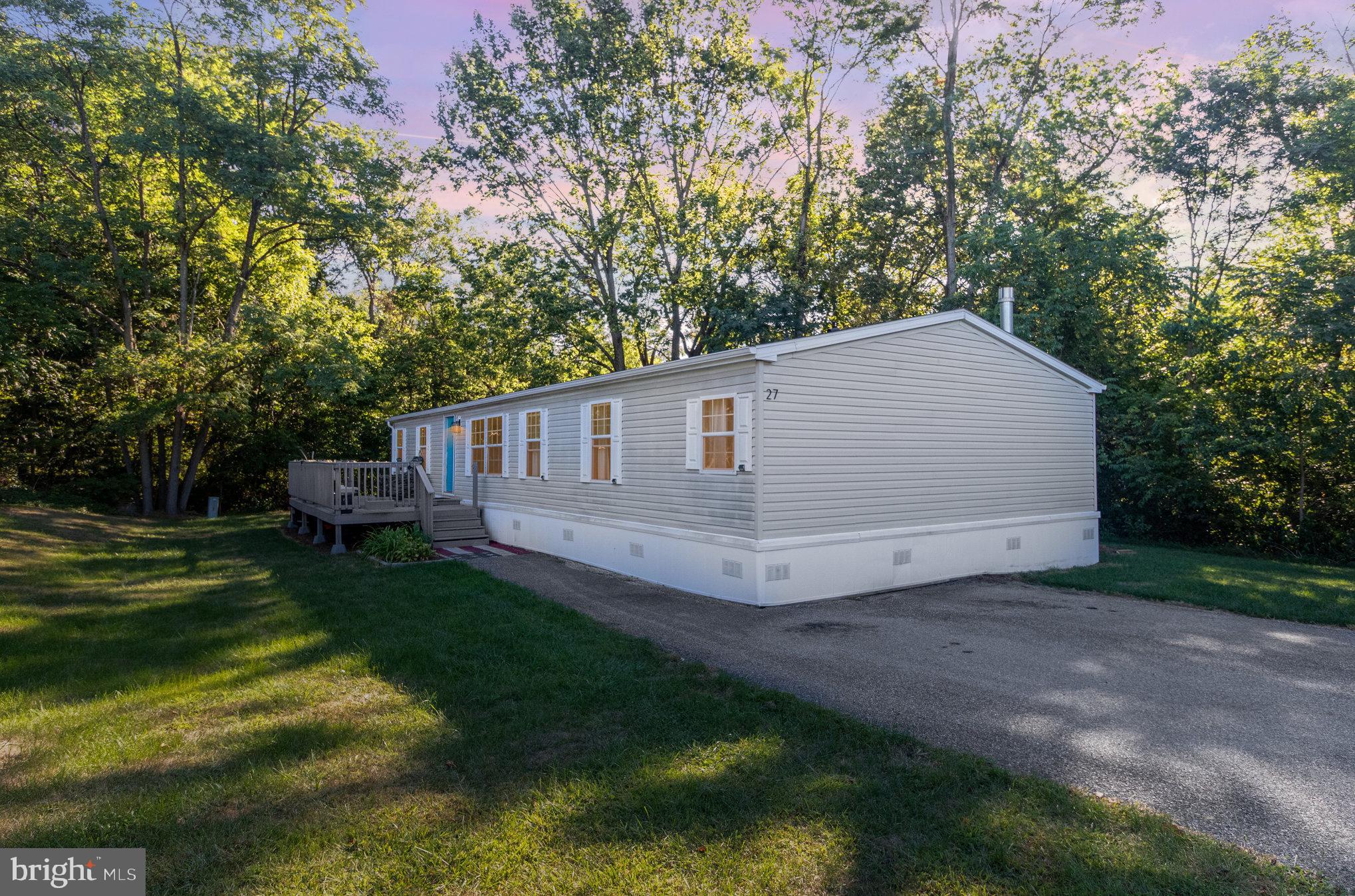 Step inside this fully remodeled 3-bedroom, 2-bath home tucked away in Regency Woods North, offering both comfort and convenience in Cumberland Valley School District. The interior shines with a refreshed kitchen featuring new countertops and a gas stove, updated bathrooms, and a bright living room anchored by a cozy new electric fireplace. A pellet stove adds charm and efficiency, helping to keep heating costs down in the winter. Outside, you’ll find plenty of space to enjoy the outdoors with a new front deck, a covered back deck, and an additional open deck area overlooking the surrounding woods for extra privacy. Located just minutes from downtown Carlisle, shopping, dining, and major routes, this home combines a peaceful setting with easy access to everything you need. Don’t miss your chance to see it. Schedule your showing today!